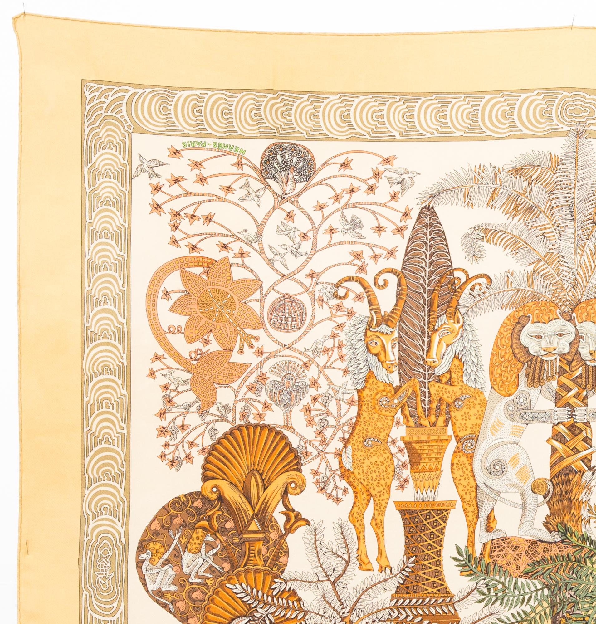 Hermes silk scarf Les Legendes de l’Arbre… by Annie Faivre featuring featuring a yellow border and a Hermès signature. 
Circa 1998
In good vintage condition. Made in France.
35,4in. (90cm)  X 35,4in. (90cm)
We guarantee you will receive this  iconic