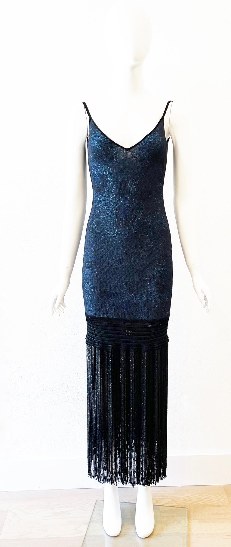 1998 SS Galliano blue metallic stretch slip dress with lace overlay and beaded fringe hem. Size S
Condition: Very good
18.5