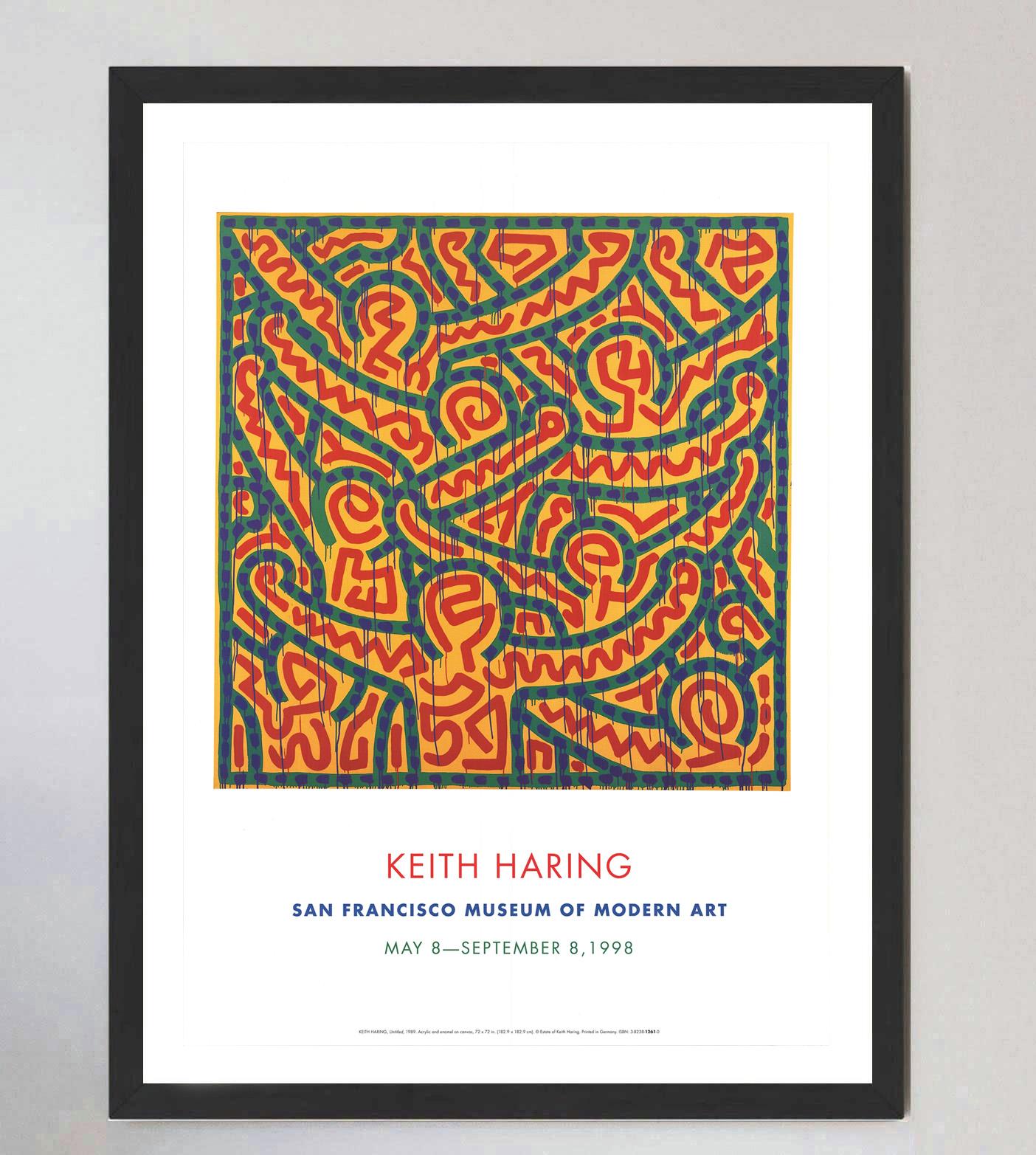 Con la sua opera senza titolo del 1989, questo brillante poster è stato creato nel 1998 per pubblicizzare la mostra del San Francisco Museum of Modern Art dedicata alle opere di Keith Haring. La mostra, che durò da maggio a settembre dello stesso
