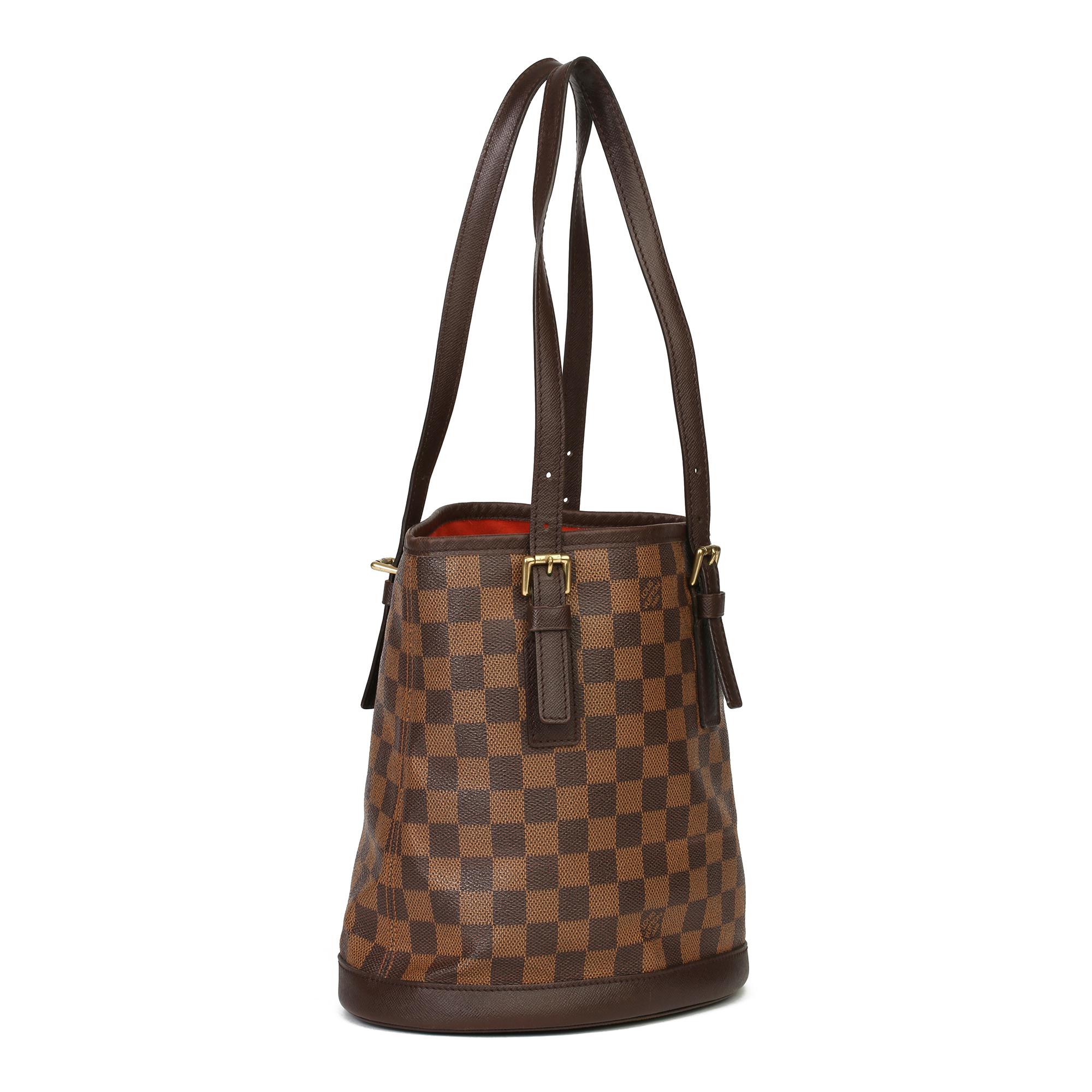 LOUIS VUITTON
Brown Damier Ebene Coated Canvas Vintage Bucket Bag

Xupes Reference: CB298
Serial Number: SP1918
Age (Circa): 1998
Accompanied By: Louis Vuitton Dust Bag
Authenticity Details: Date Stamp (Made in France) 
Gender: Ladies
Type: