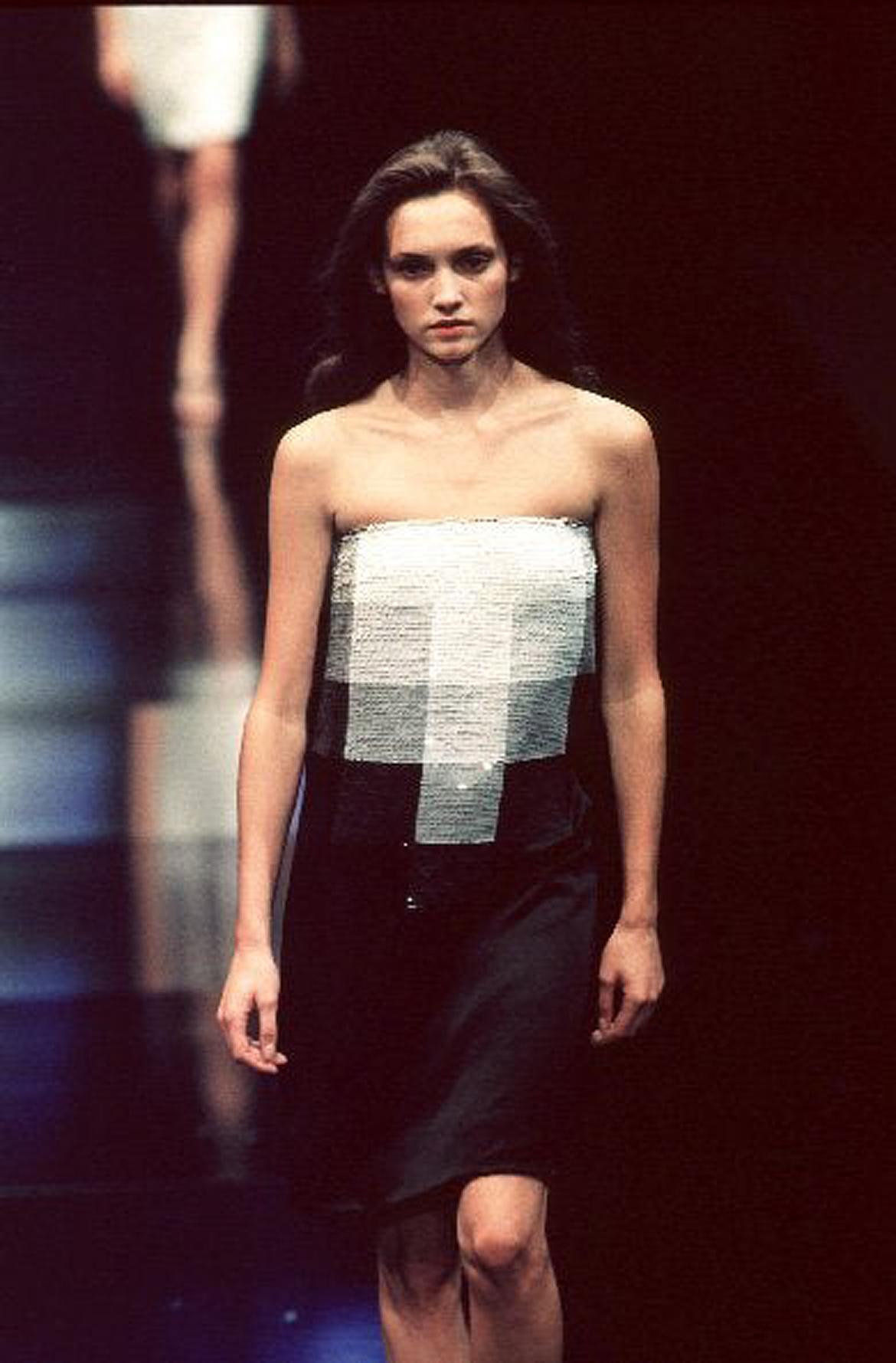 Gorgeous Alexander McQueen for Givenchy spring-summer runway strapless dress from his 1999 documented collection. This highly stylized yet effortless piece is a perfect example of why the magical of Alexander McQueen is so missed. Made of the