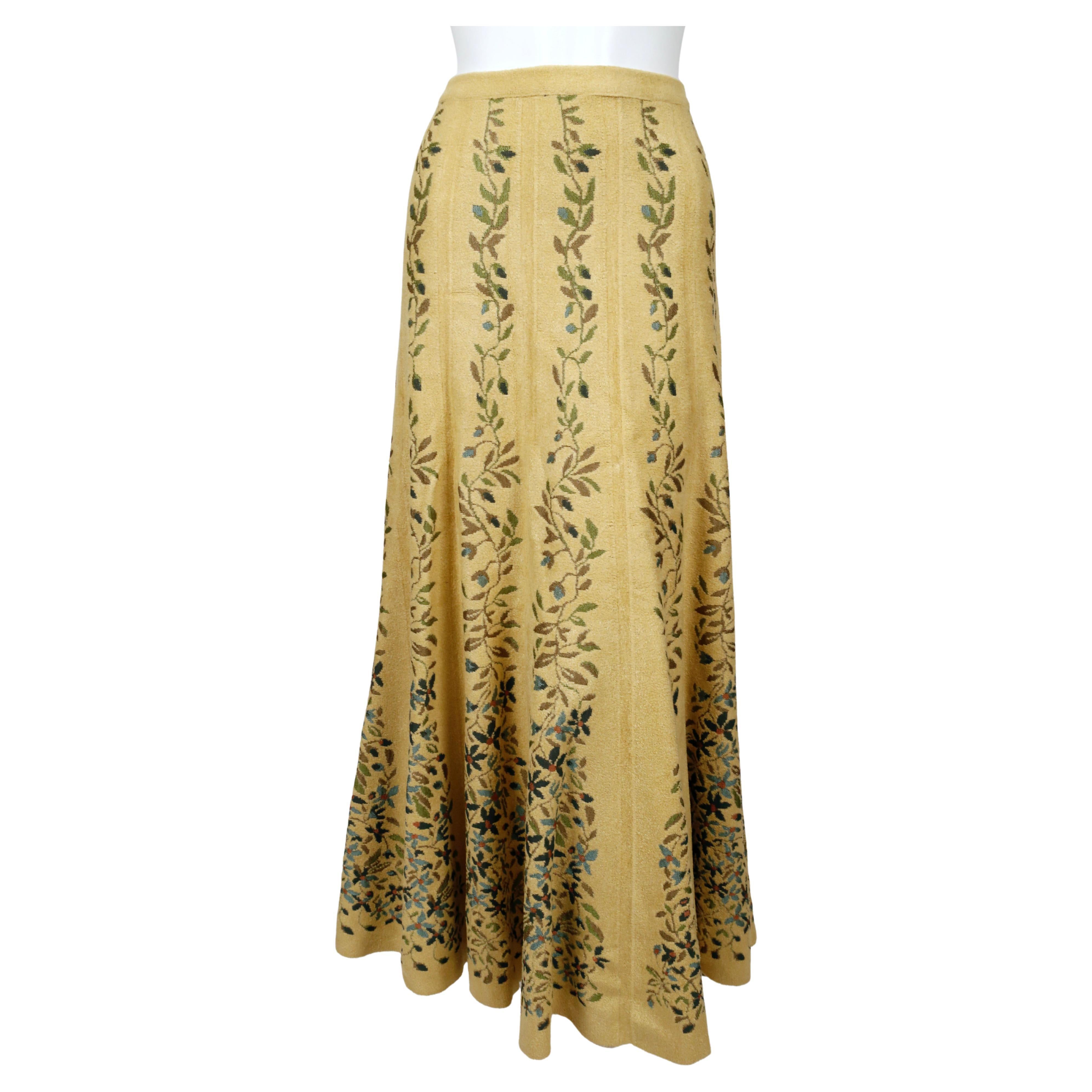 Very rare, pale-yellow floor length knit skirt with floral intarsia knit detail from Azzedine Alaia dating to the fall of 1999 as seen on Karolína Kurková from the pages of Elle magazine. Labeled a size M however this best fits a S or M. Approximate