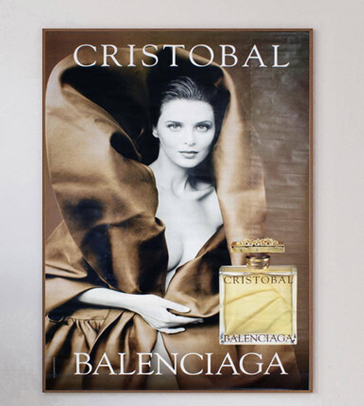 Extra-large poster promoting the Balenciaga fragrance, Cristobal - the namesake of the founder. This stunning and rare poster features model and actress Isabella Rossellini and was released in 1999.

Cristobal Balenciaga founded the luxury fashion