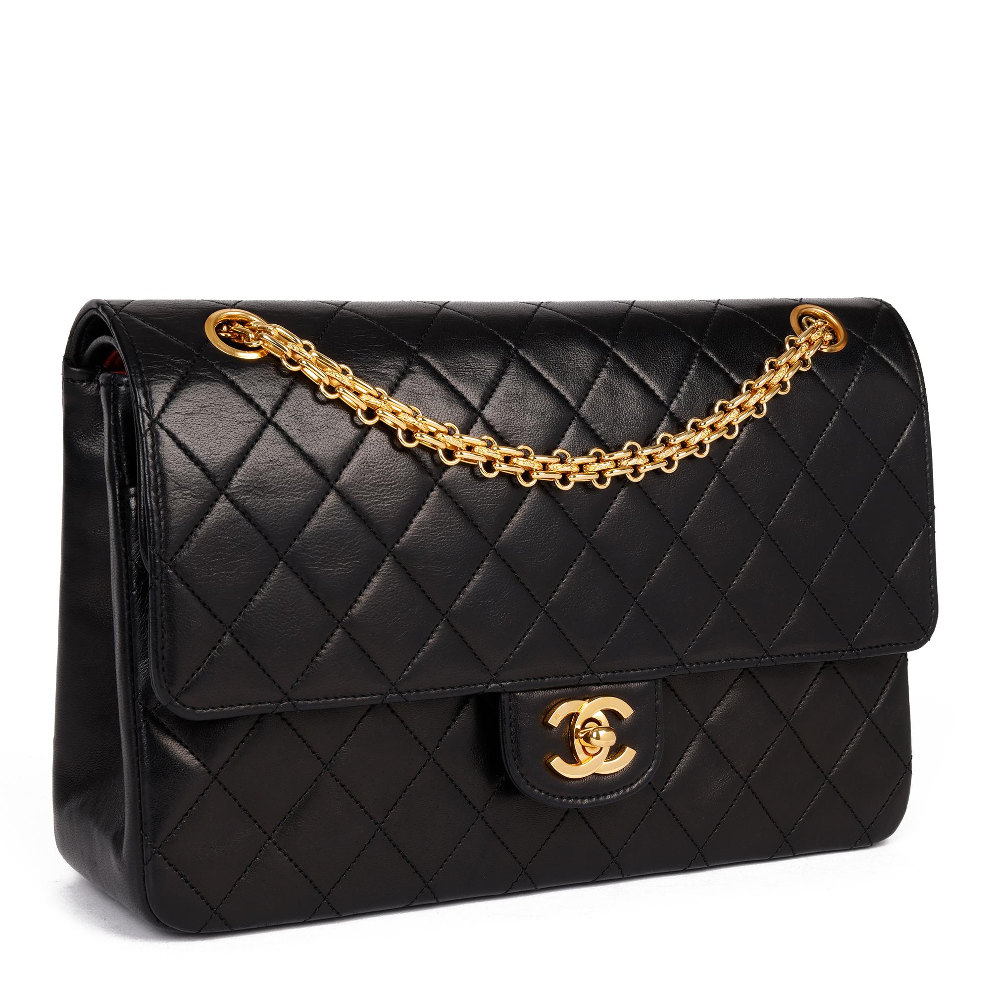 CHANEL
Black Quilted Lambskin Leather Vintage Classic Double Flap Bag

Xupes Reference: HB3906
Serial Number: 566653
Age (Circa): 1999
Accompanied By: Chanel Dust Bag, Box
Authenticity Details: Serial Sticker (Made in France) 
Gender: Ladies
Type: