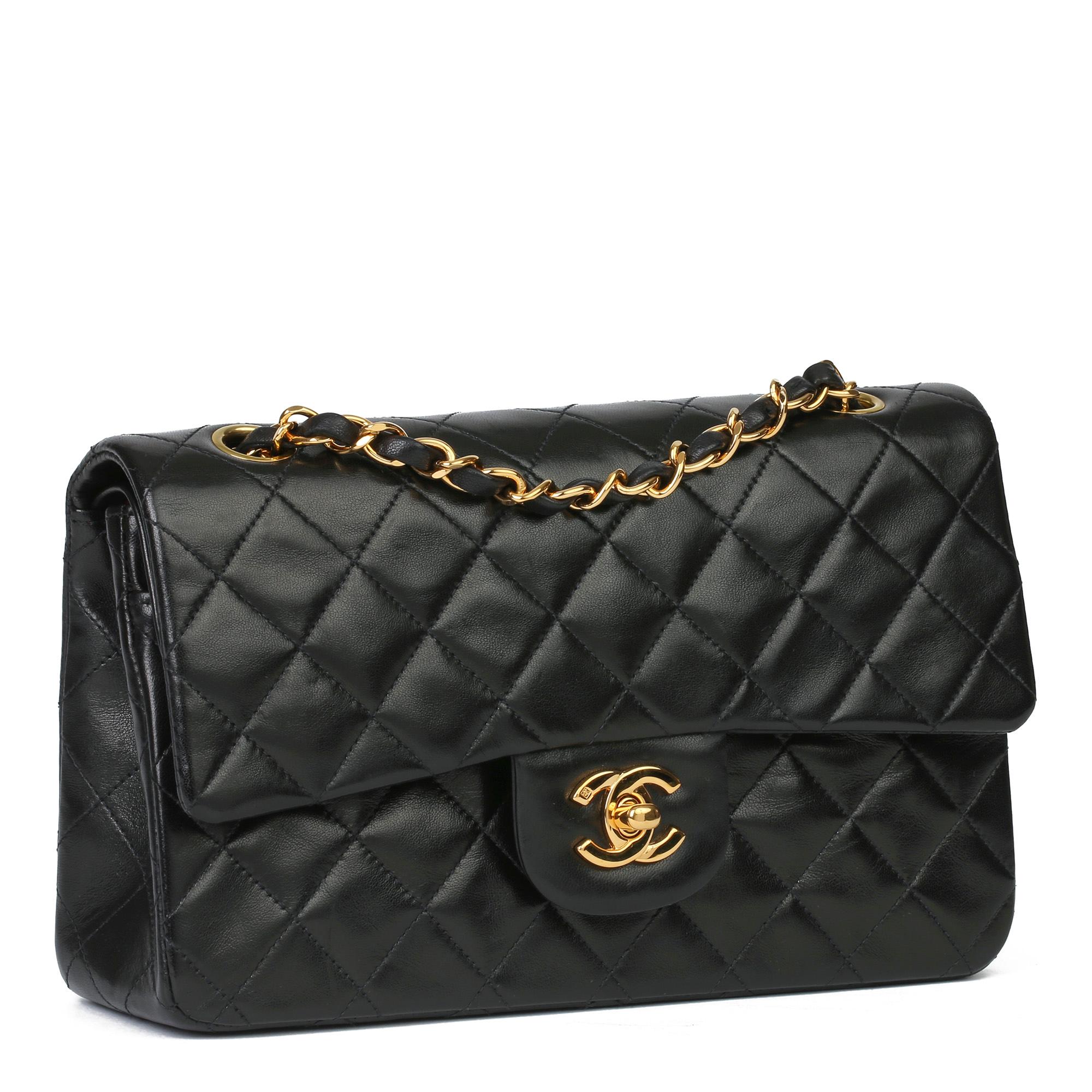CHANEL 
Black Quilted Lambskin Vintage Small Classic Double Flap Bag 

Xupes Reference: HB3896
Serial Number: 5169140
Age (Circa): 1999
Accompanied By: Chanel Dust Bag, Box, Authenticity Card, Care Booklet
Authenticity Details: Authenticity Card,