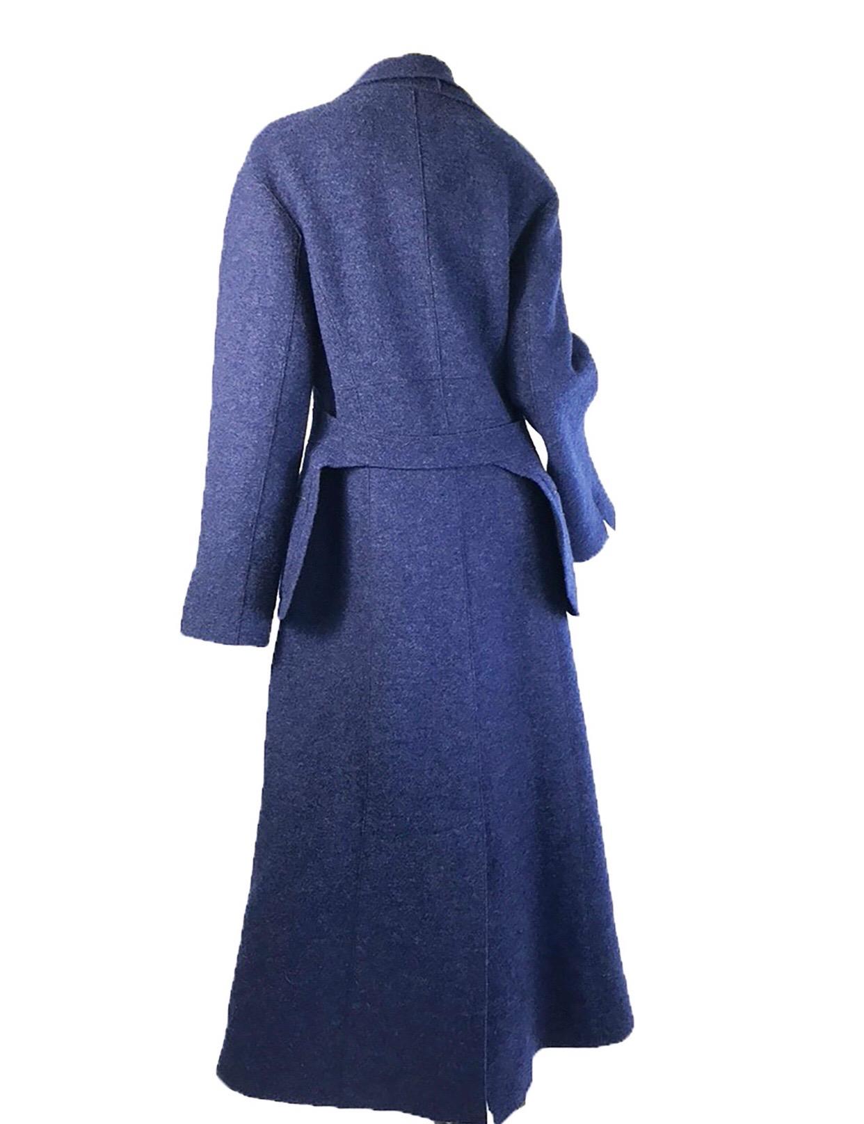 1999 Chanel blue wool coat with halter pocket belt. Condition: Excellent. Size L / US 10/ FR 42

38
