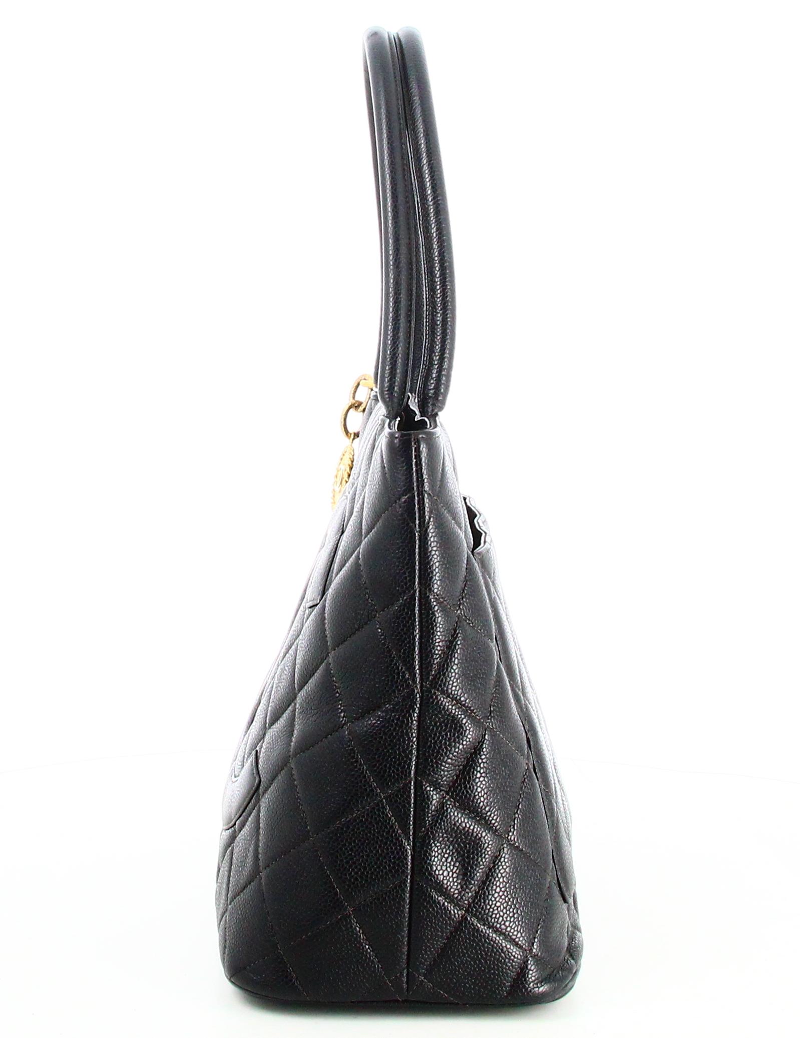 Women's 1999 Chanel Padded Black Leather Medallion Handbag  For Sale