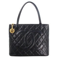 Vintage 1999 Chanel Padded Black Leather Medallion Handbag 