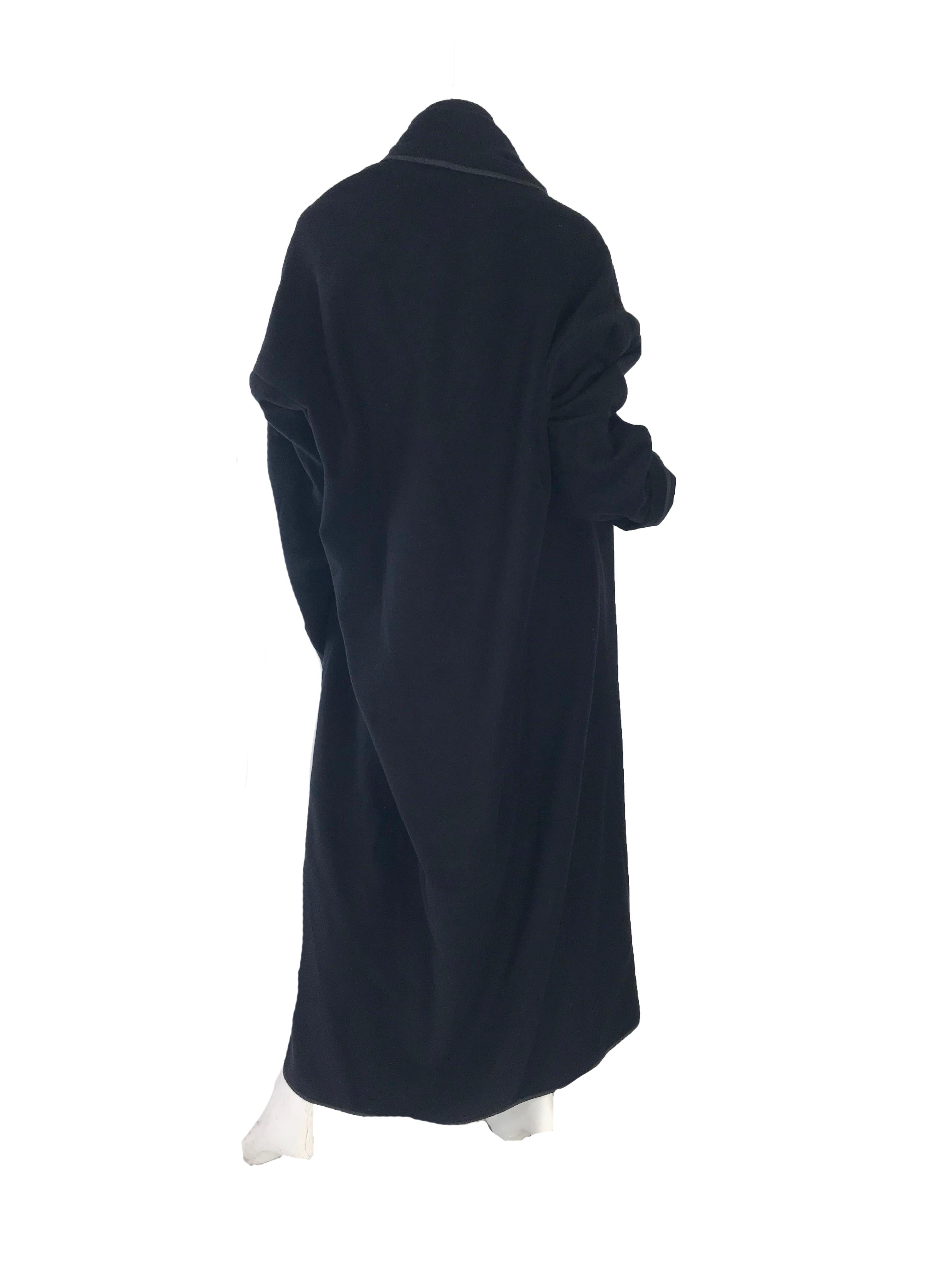 1999 Comme des Garcons black cashmere oversized shawl coat.

C. 1999
Made in Japan
Cashmere
Size M
