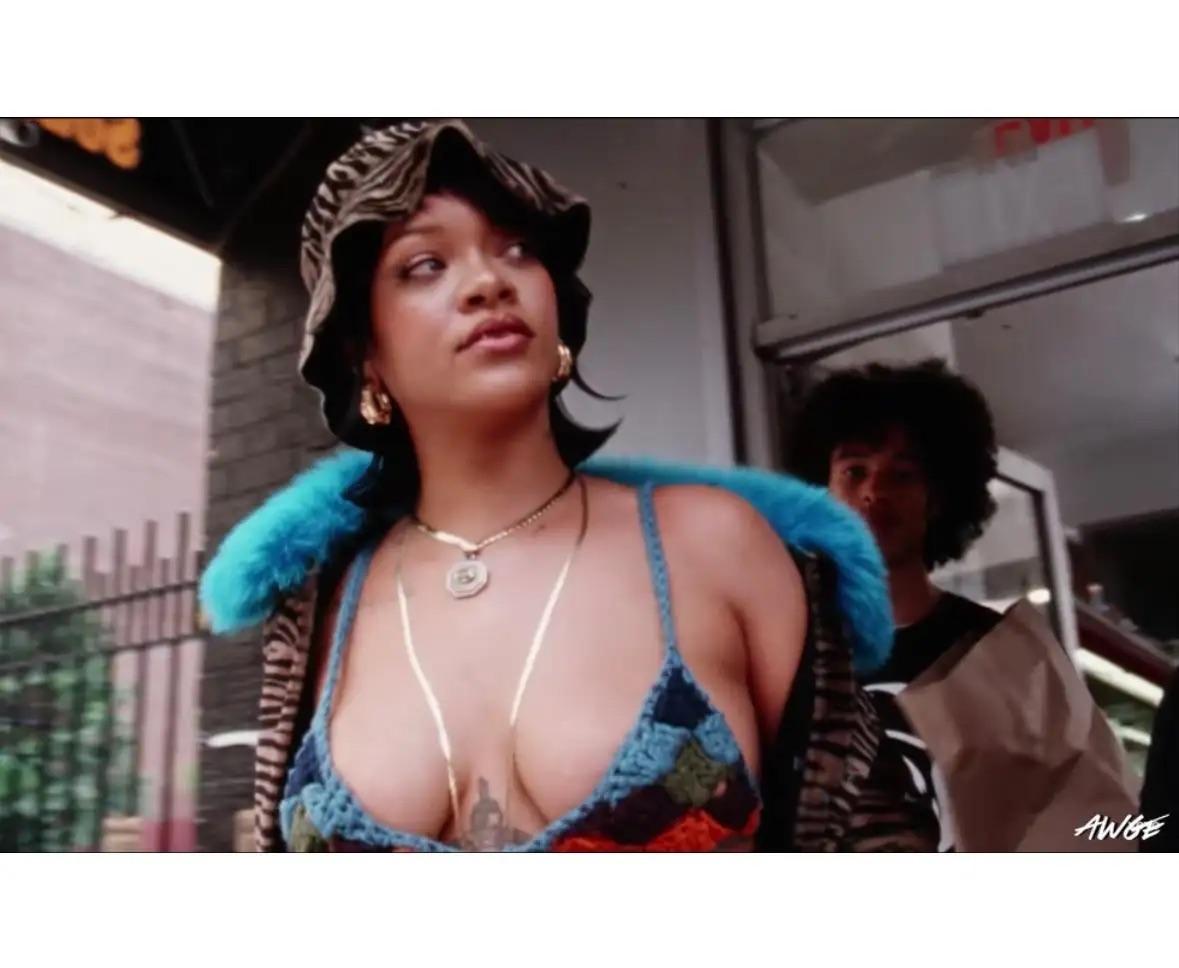 Donatella Versace designed this chic bucket hat for her Fall/Winter 1999 Gianni Versace collection. Constructed of brown and black tiger print pony hair, this coat is covered in tiny embroidered flowers and features a small brim. As worn by Rihanna