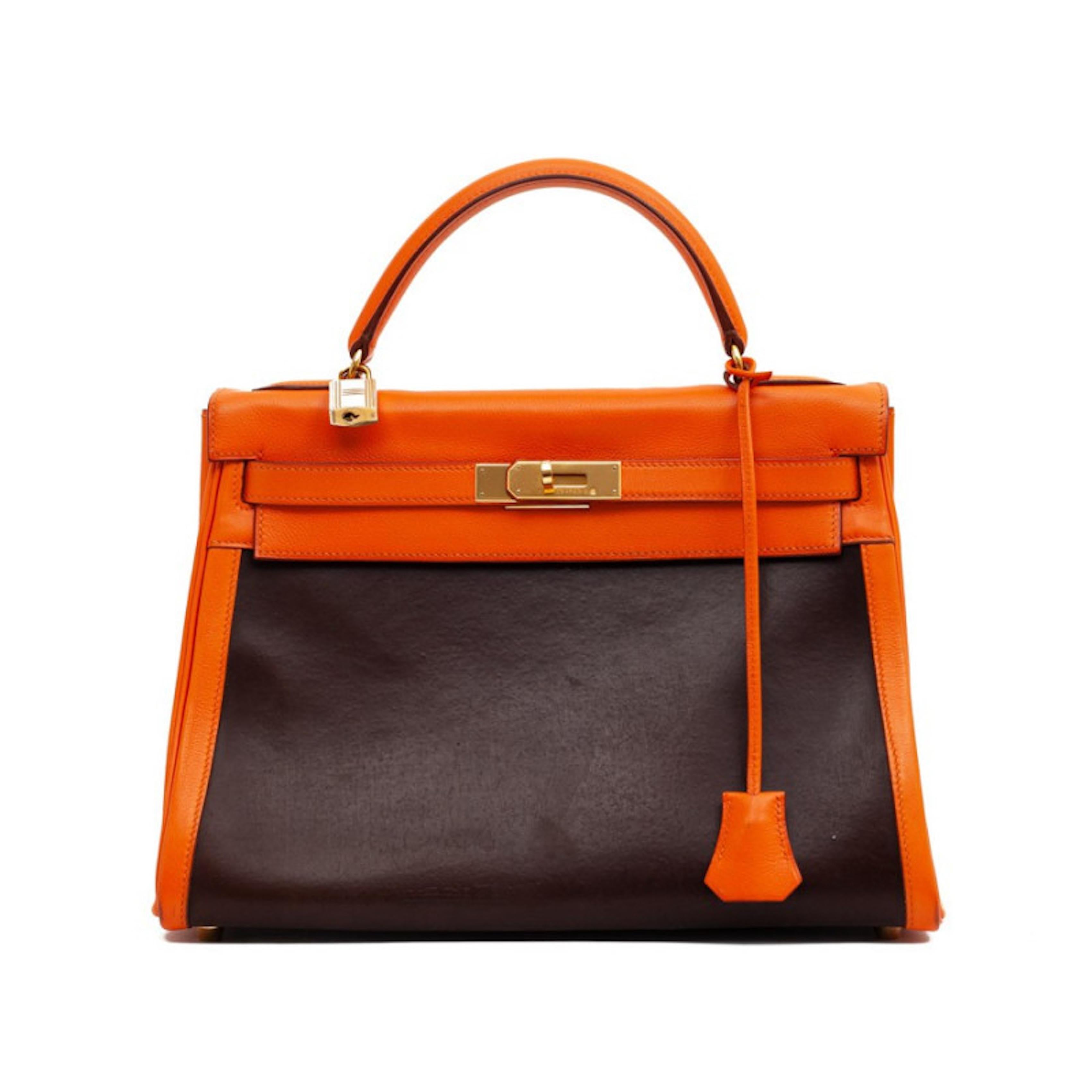 Raro Hermès Kelly Amazonia bicolor y bimateria entregado en su funda guardapolvo original Hermès.
Estado: muy buen estado
Fabricado en Francia
Material: Piel Swift y material Amazonia 
Color: marrón, albaricoque
Dimensiones: 32 x 22 x 11 cm
Letra C