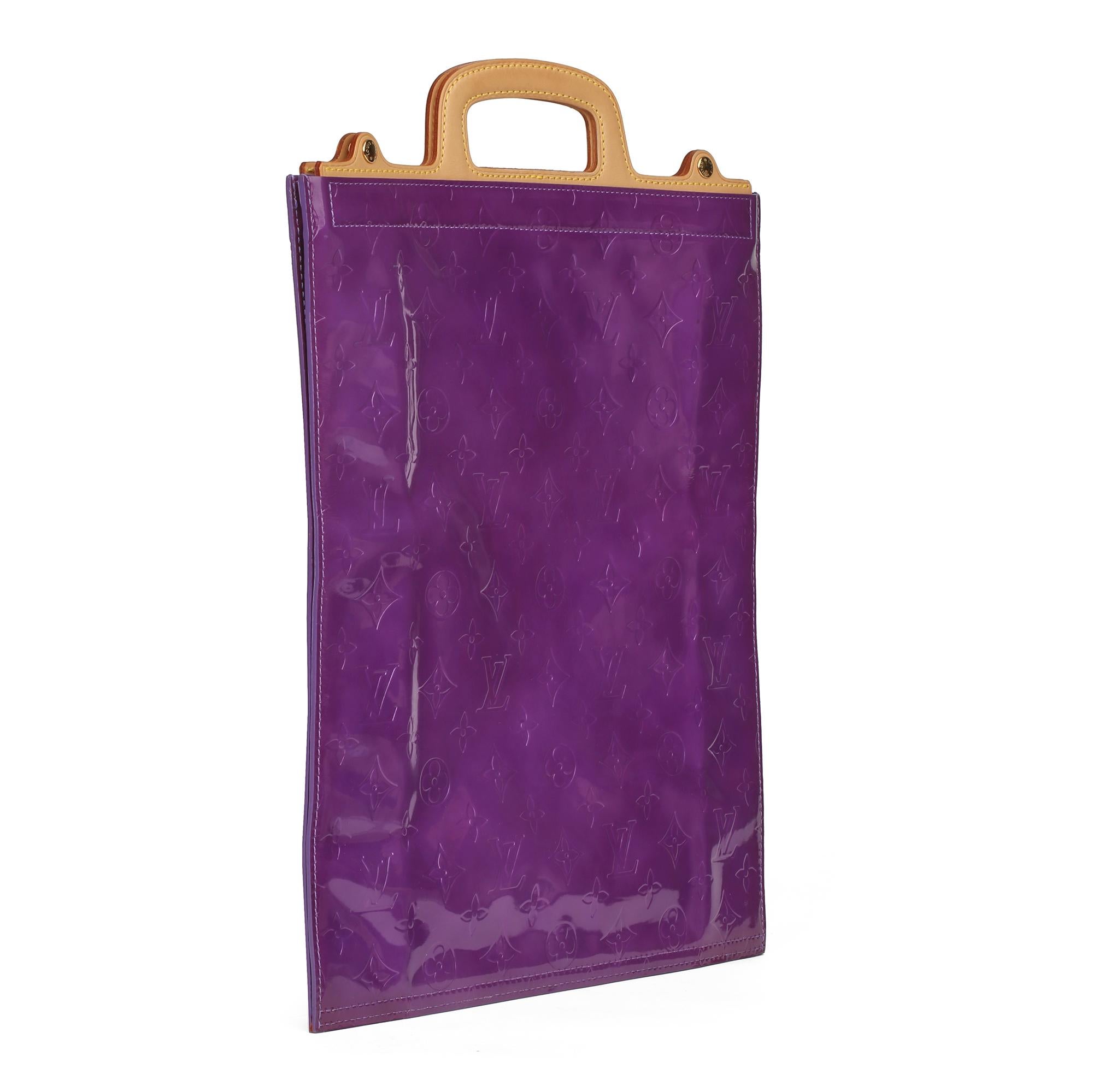 LOUIS VUITTON
Purple Monogram Vernis Leather & Vachetta Leather Vintage Stanton

Xupes Reference: CB299
Serial Number: TH1929
Age (Circa): 1999
Accompanied By: Louis Vuitton Dust Bag
Authenticity Details: Date Stamp (Made in France) 
Gender: