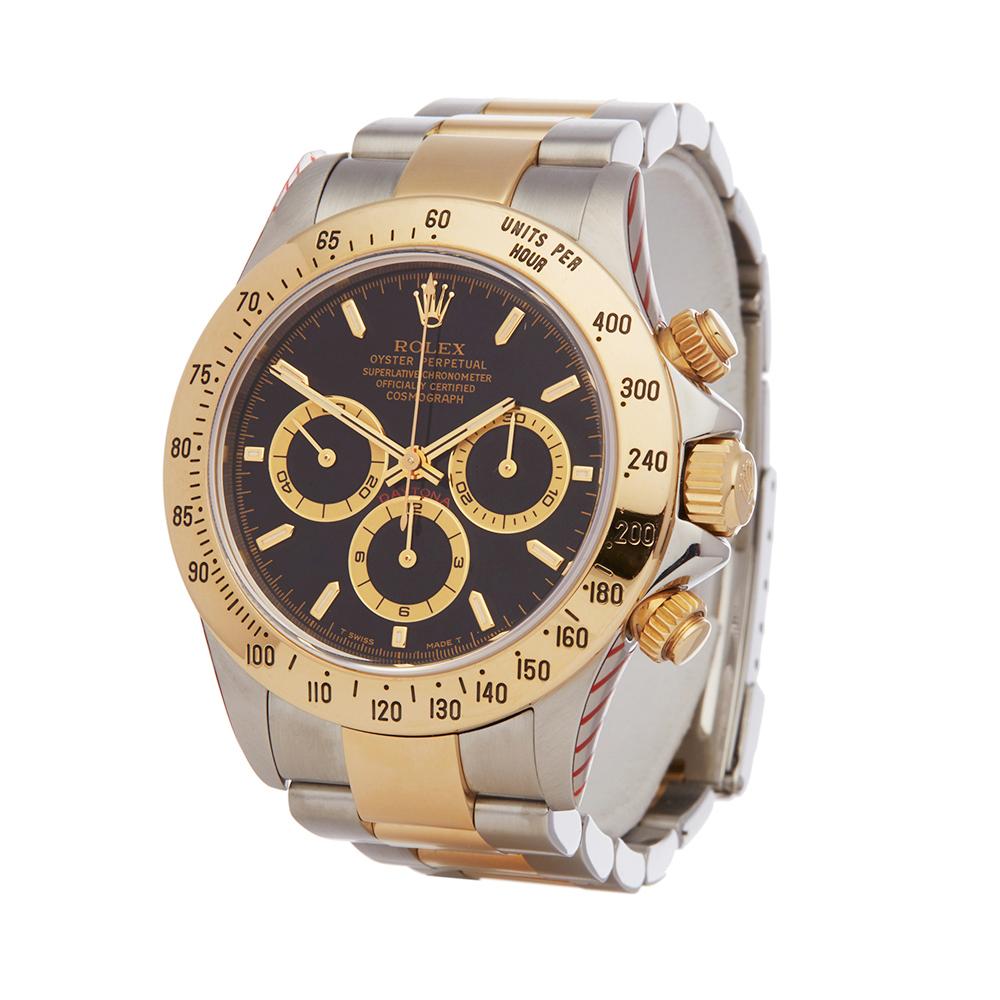 Contemporary 1999 Rolex Daytona Steel & Yellow Gold 16523 Wristwatch
 *
 *Complete with: Box & Service Papers dated 13th December 2017 dated 1999
 *Case Size: 40mm
 *Strap: Stainless Steel & 18K Yellow Gold Oyster
 *Age: 1999
 *Strap length: