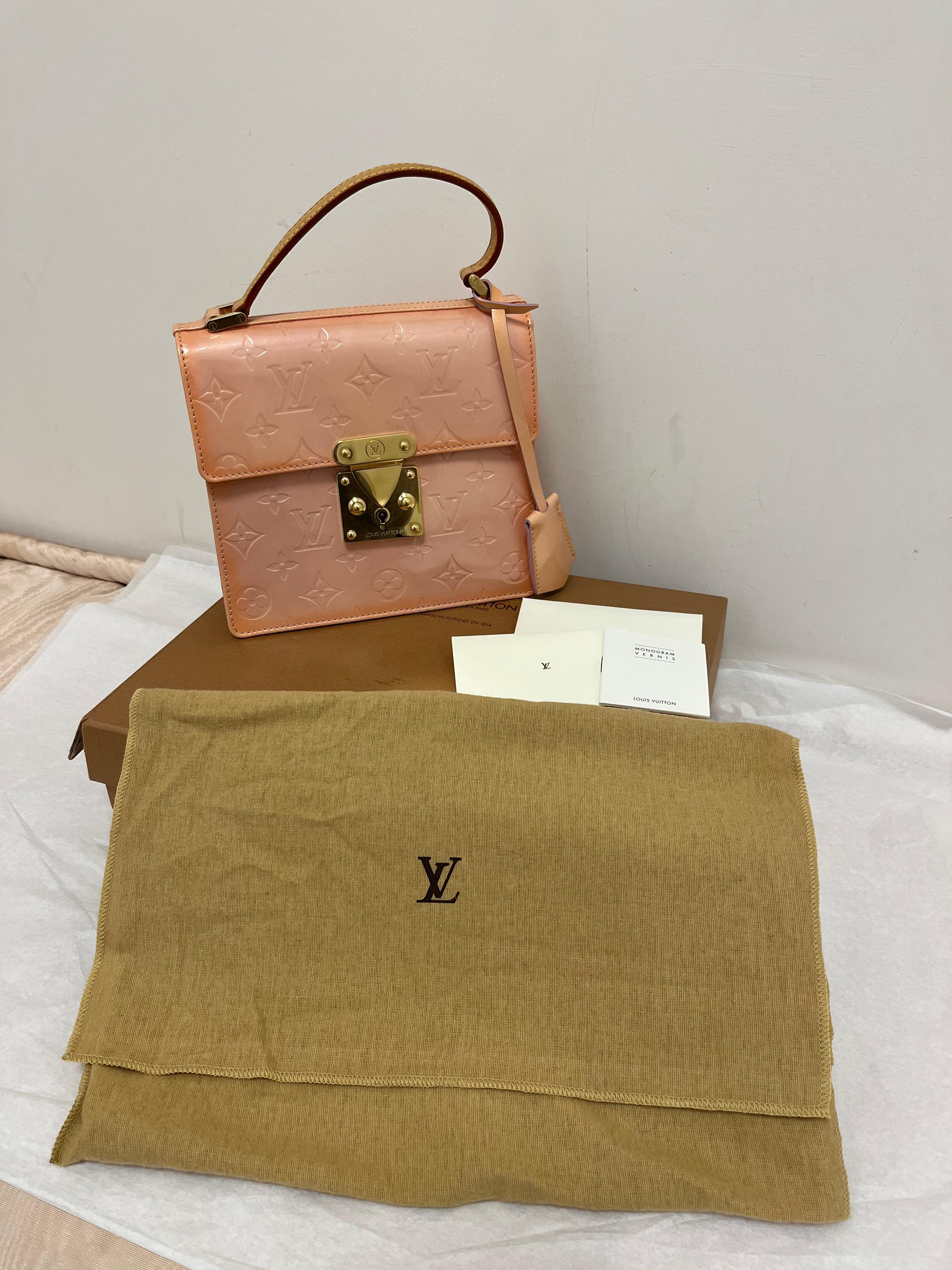 In excellent condition, this ombre pink/orange handbag, can be worn with leggings/jeans, as well as a cocktail dress, and in between. 
The bag was made in France and the serial# is VI0939 or March 1999; has gold-tone hardware; key and clochette;