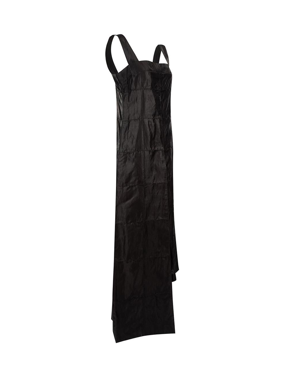 CONDITION is Very good. Hardly any visible wear to dress is evident however size/composition label has been partially cut on this used Chanel designer resale item.



Details


1999

Black

Silk

Midi dress

Sleeveless

Square neck

Panelled