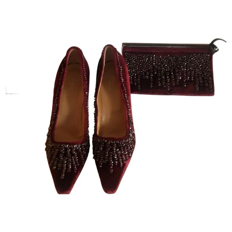 Rare Vintage Gucci 
Brand new with box and dust bag collectible evening velvet shoes and clutch bag.
Burgundy
Real onyx stones

Shoes Size: US - 7
Made in Italy
New condition