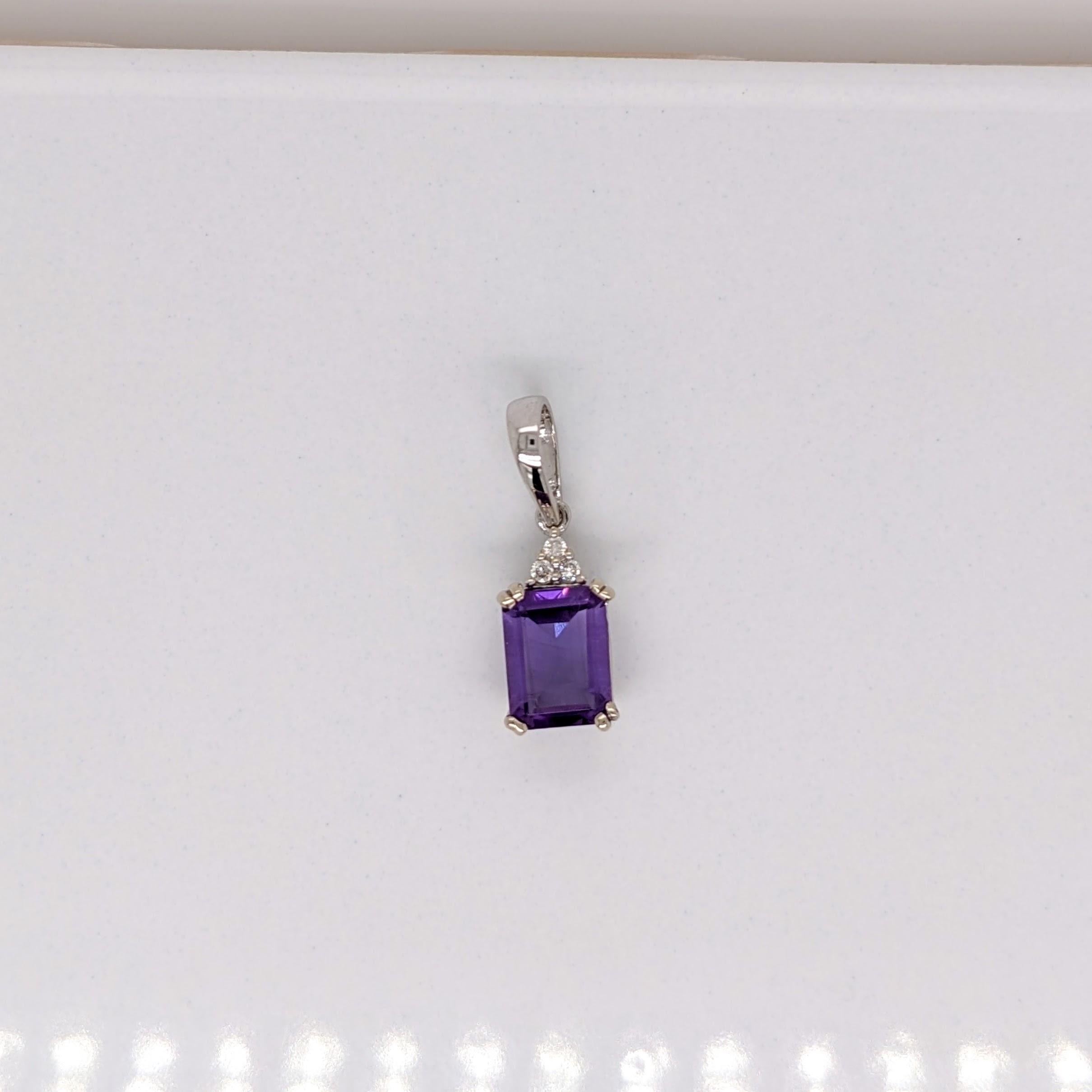 Specifications:

Item Type: Pendant
Center Stone: Amethyst
Treatment: Heated
Weight: 1.99ct
Head size: 8x6mm
Cut: Emerald
Hardness: 7
Origin: Zambia

Metal: 14k/1.01g
Diamonds SI/GH: 3/0.06 cttw

Sku: AJP140/1004

This pendant is made with solid 14k
