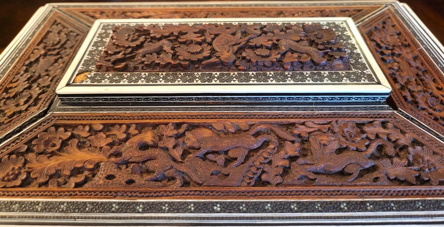 19C Anglo Indian Highly Carved Padouk and Sandalwood Sadeli Mosaic Sarcophagus S In Good Condition For Sale In Dallas, TX