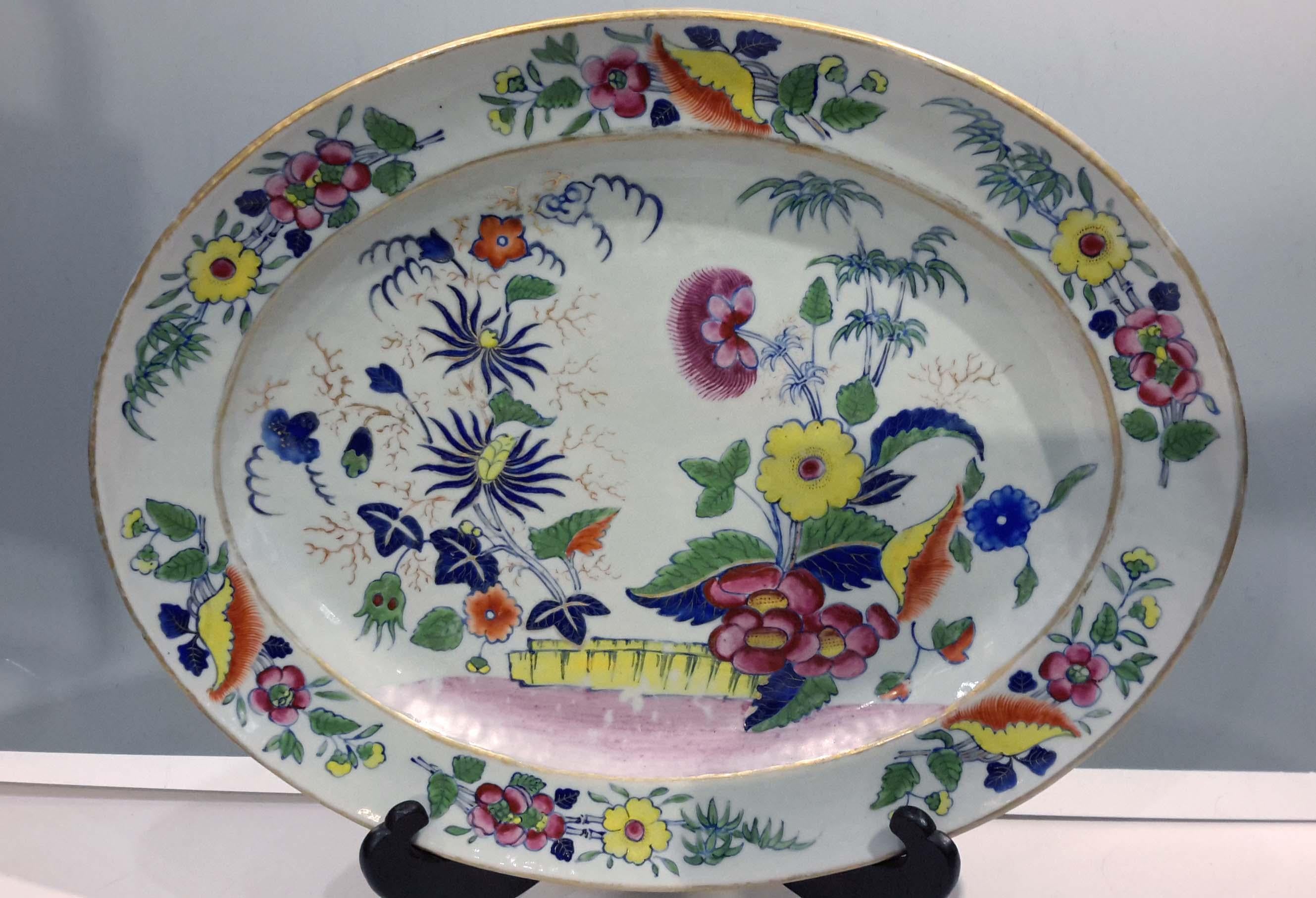 19th century, Chinese export porcelain platter. Beautifully enameled and gilded,
circa mid-19th century and made for export market. It is rare to see this combination of colors, especially the yellow.
  