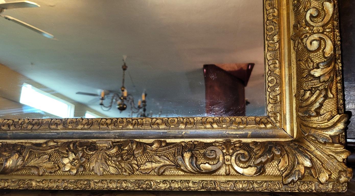 Gesso 19th Century English Baroque Gilt Floral Wall Mirror For Sale