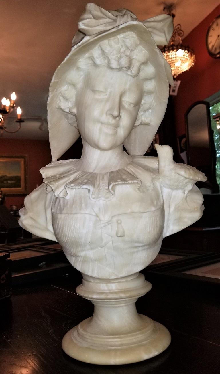 Presenting a beautiful 19th century French white alabaster bust of lady in Bonnet.

From circa 1880, this bust is gorgeous in it’s detail and subject matter.

Made in probably, France it is a carved white alabaster bust of a beautiful young lady in