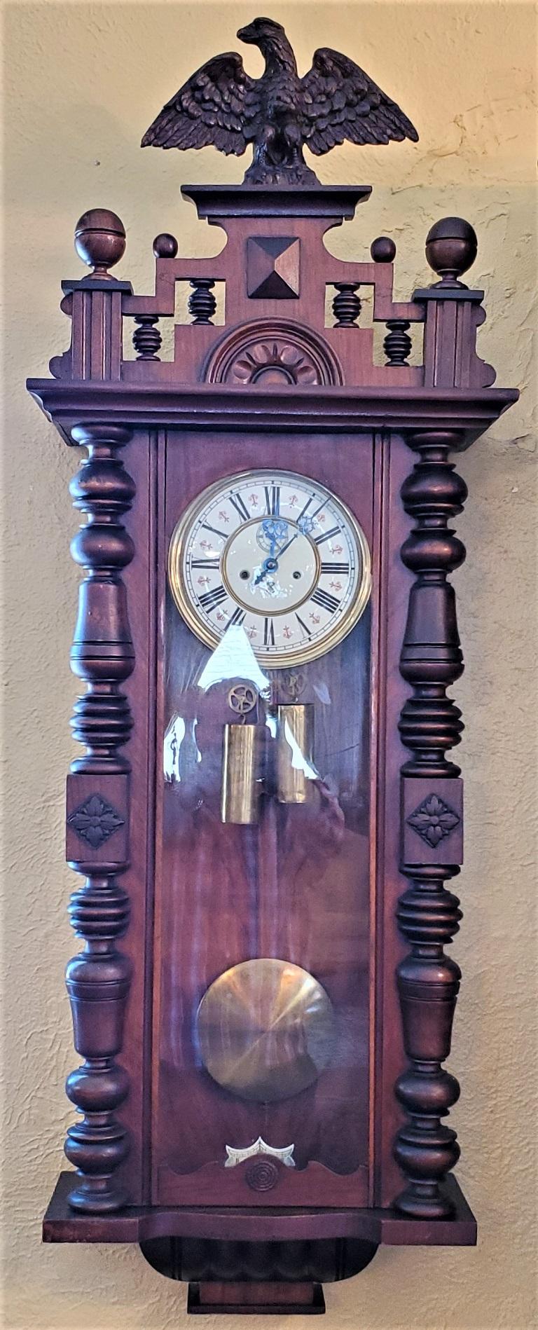 PRESENTING A GORGEOUS 19C Gustav Becker Vienna Wall Clock.

Made by the famous clockmaker, Gustav Becker circa 1880 in Germany.

The Clock, is in good original and untouched condition.

The removeable pelmet has an eagle on top which is marked on