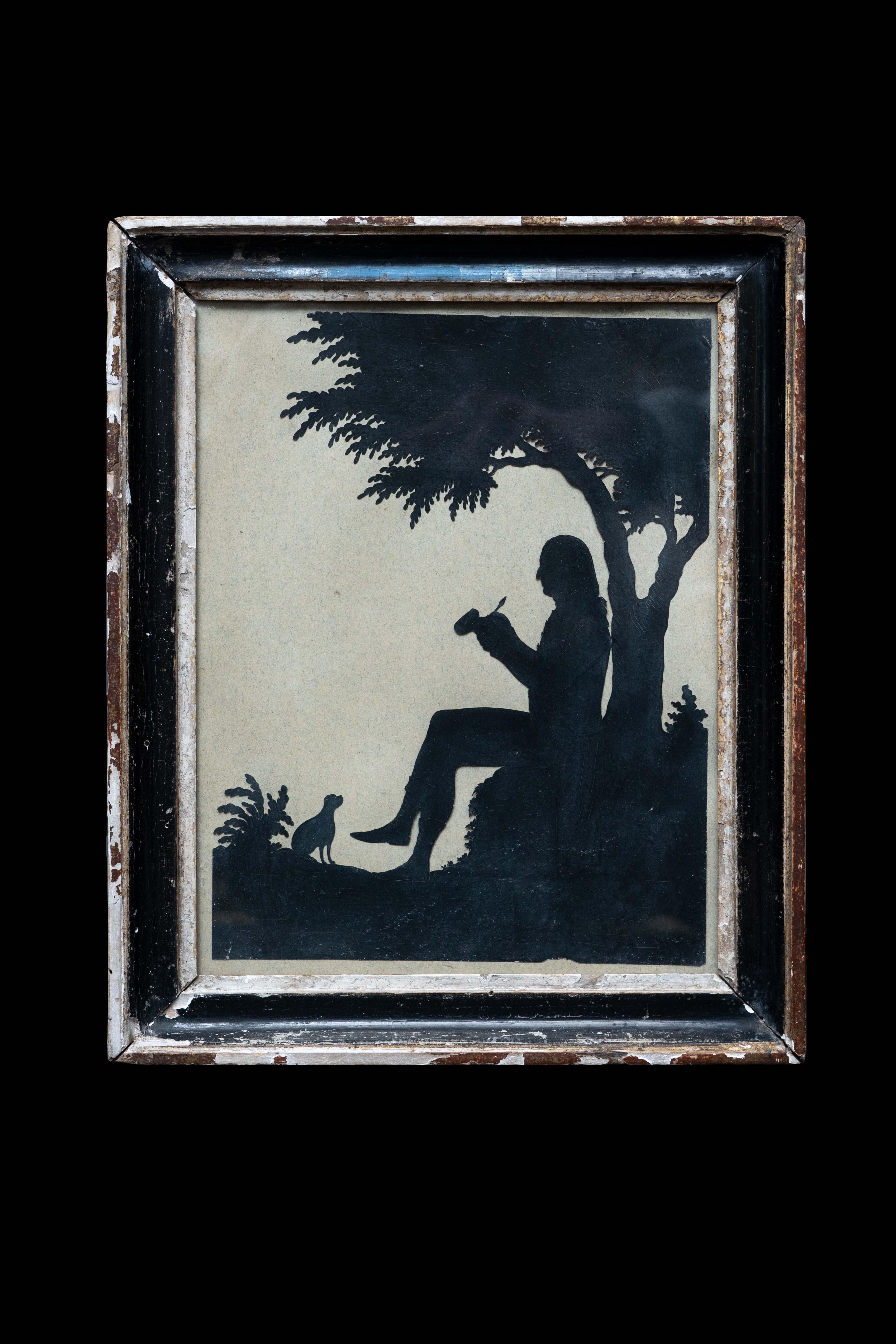 Silhouette scene of a man smoking a pipe with his dog C 1840 ATT Auguste Edouant.

Auguste Amant Constant Fidèle Edouart was a French-born portrait artist who worked in England, Scotland and the United States in the 19th century. He specialised in