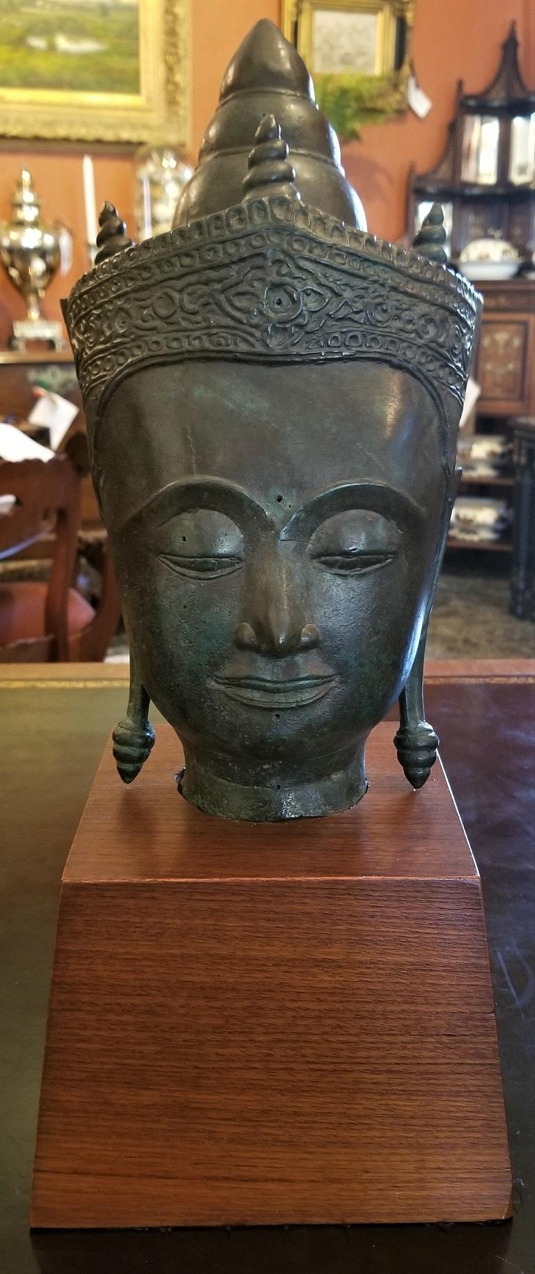 Presenting a stunning 19th century Thai bronze Buddha head on stand.

From circa 1860-80 and from South Eastern Asia, most likely Thailand.

This is a hollow cast bronze head of Buddha, in the Classic South East Asian design and