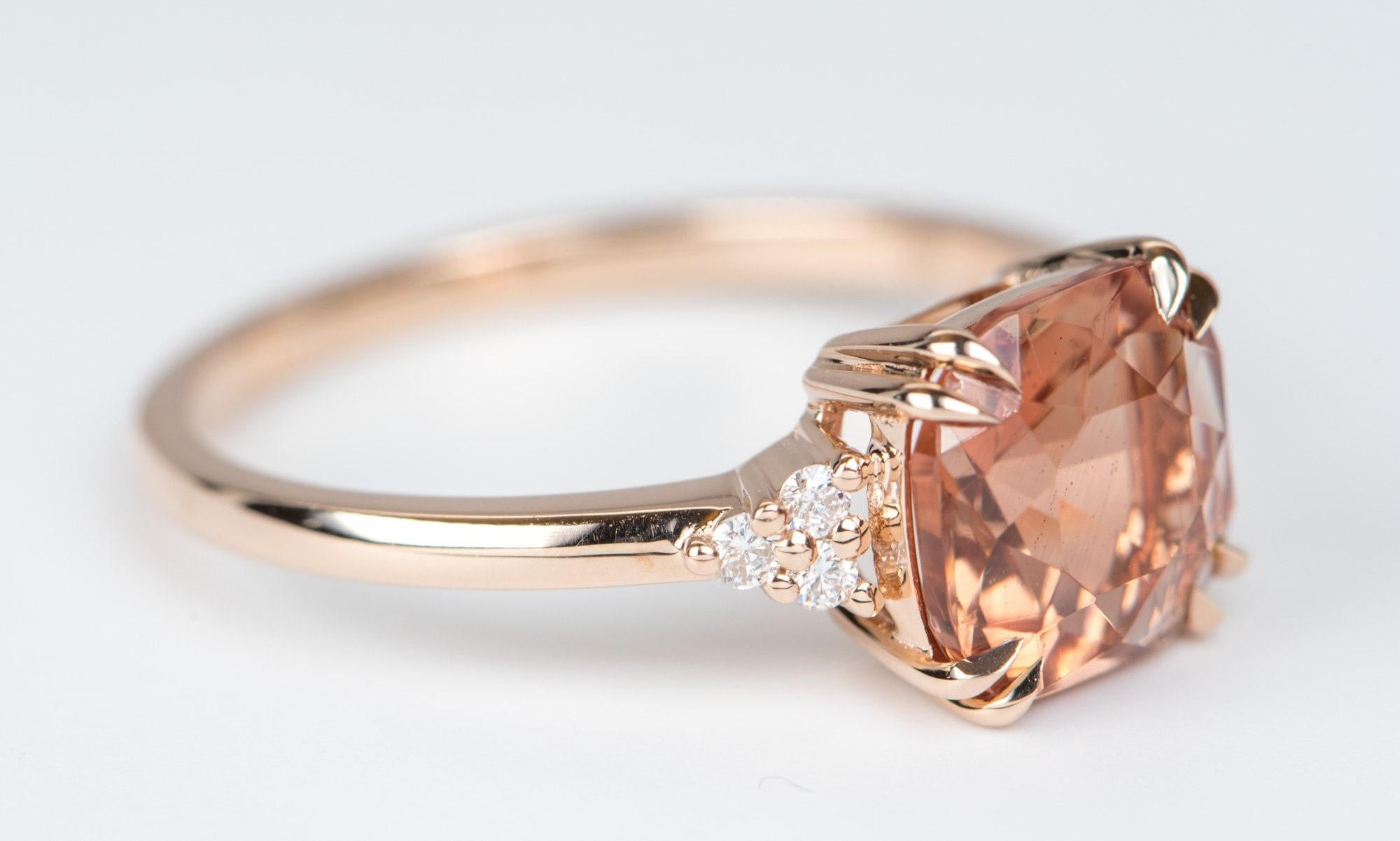 â™¥ Solid 14K rose gold ring set with an rectangle-shaped reddish orange Oregon sunstone in the center with a trio of diamonds on each side
â™¥ The overall setting measures 14.2mm wide, 8.2mm in length, and sits 5.5mm tall from the finger


â™¥ Ring