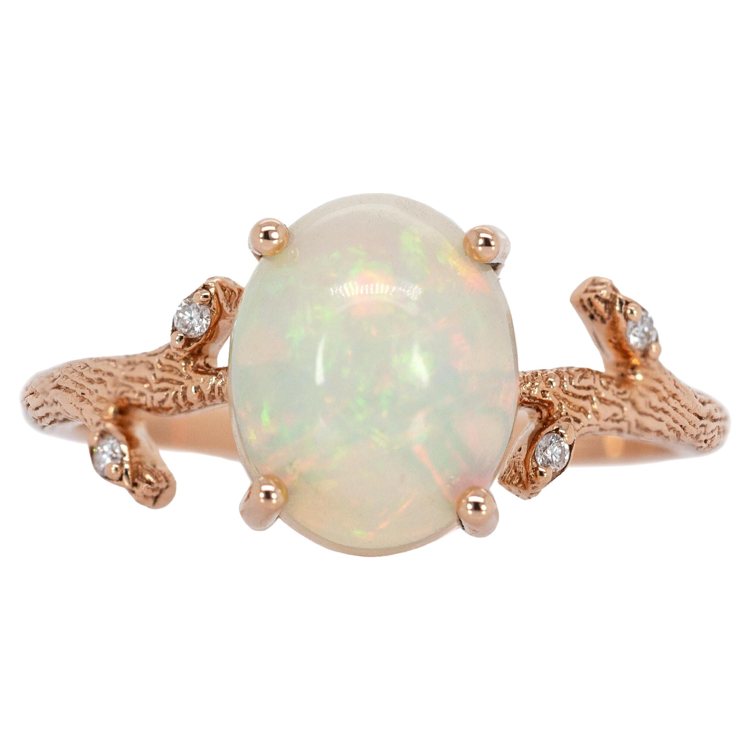 Anillo de ópalo etíope de 1,9 quilates con detalles de diamantes en oro rosa de 14 quilates  Oval 10x8mm