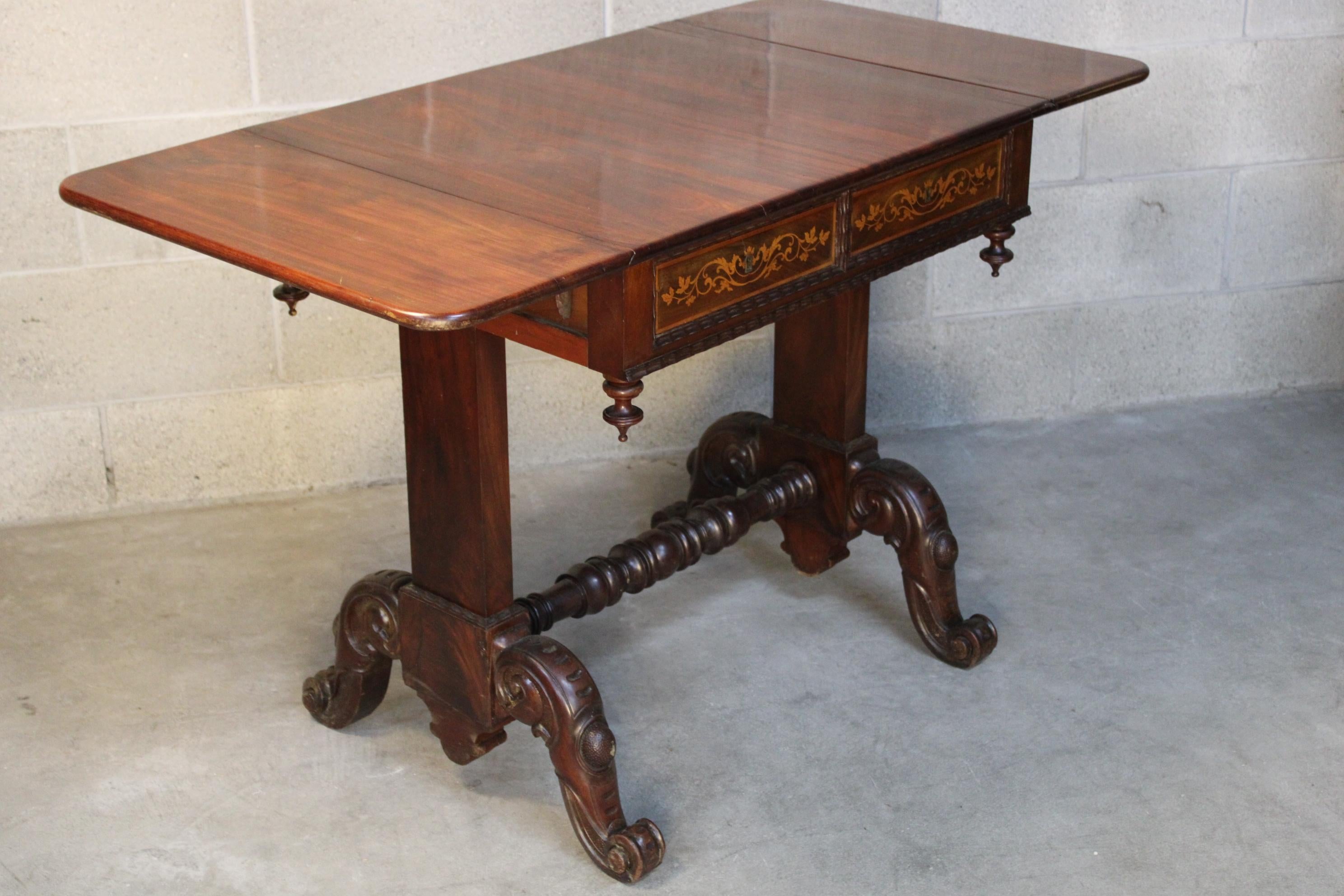 19th century inlaid Louis Philippe period center table in mahogany circa 1840 France
in good solid condition. Key is working
Dimensions:
 closed 60x70x75H cm. open 60x122x75H cm.
will be shipped inside a safe wood crate