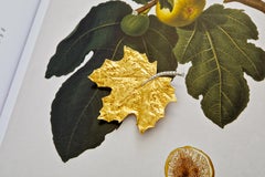 Broche feuille en or 19k et diamant