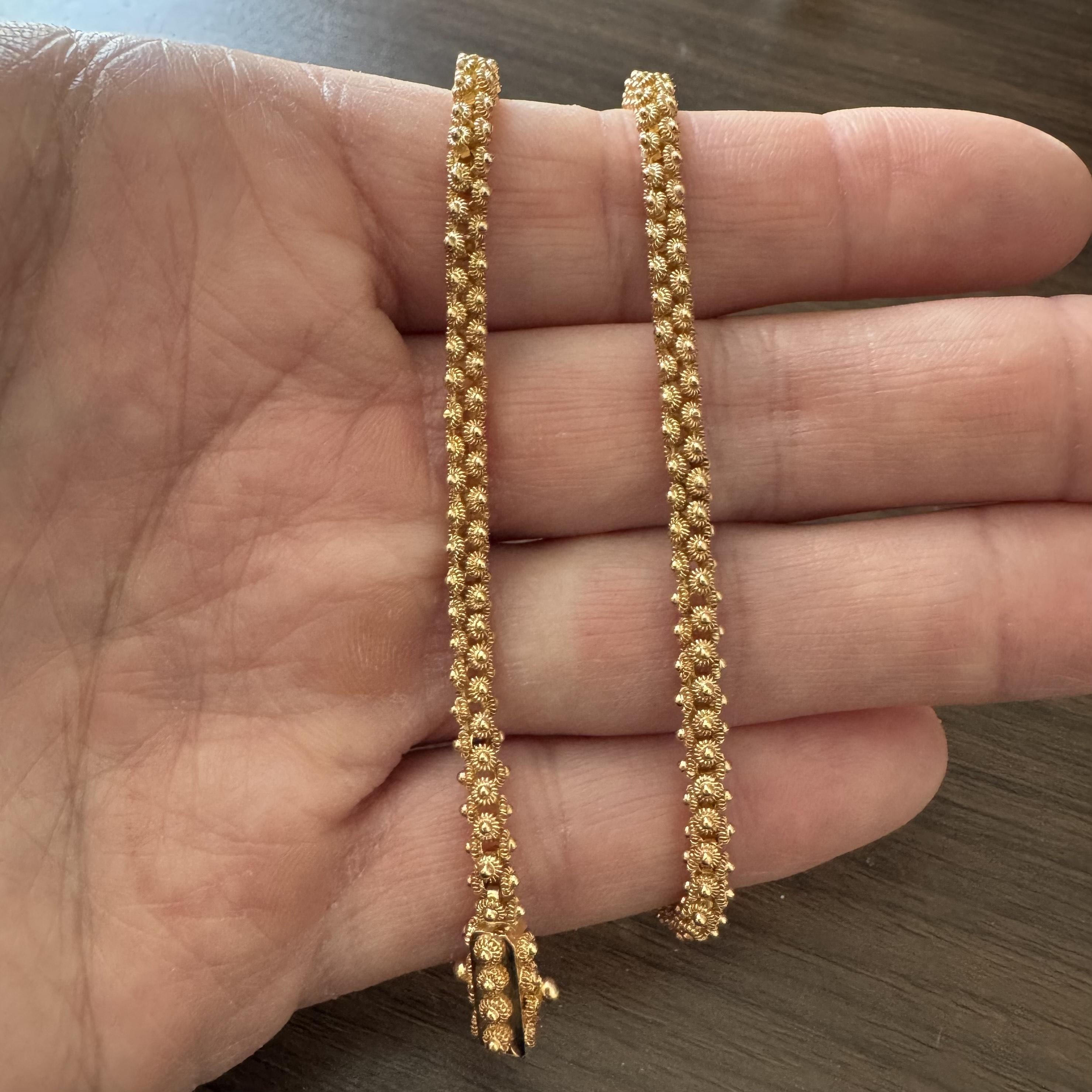 Condition:  Excellent Condition, Professionally Cleaned and Polished
Metal:  19k Gold (Marked, and Professionally Tested)
Weight:  27.4g
Length:  14 Inches
Width:  5mm
Closure:  Box Tab Insert with Safety Latch
Markings:  