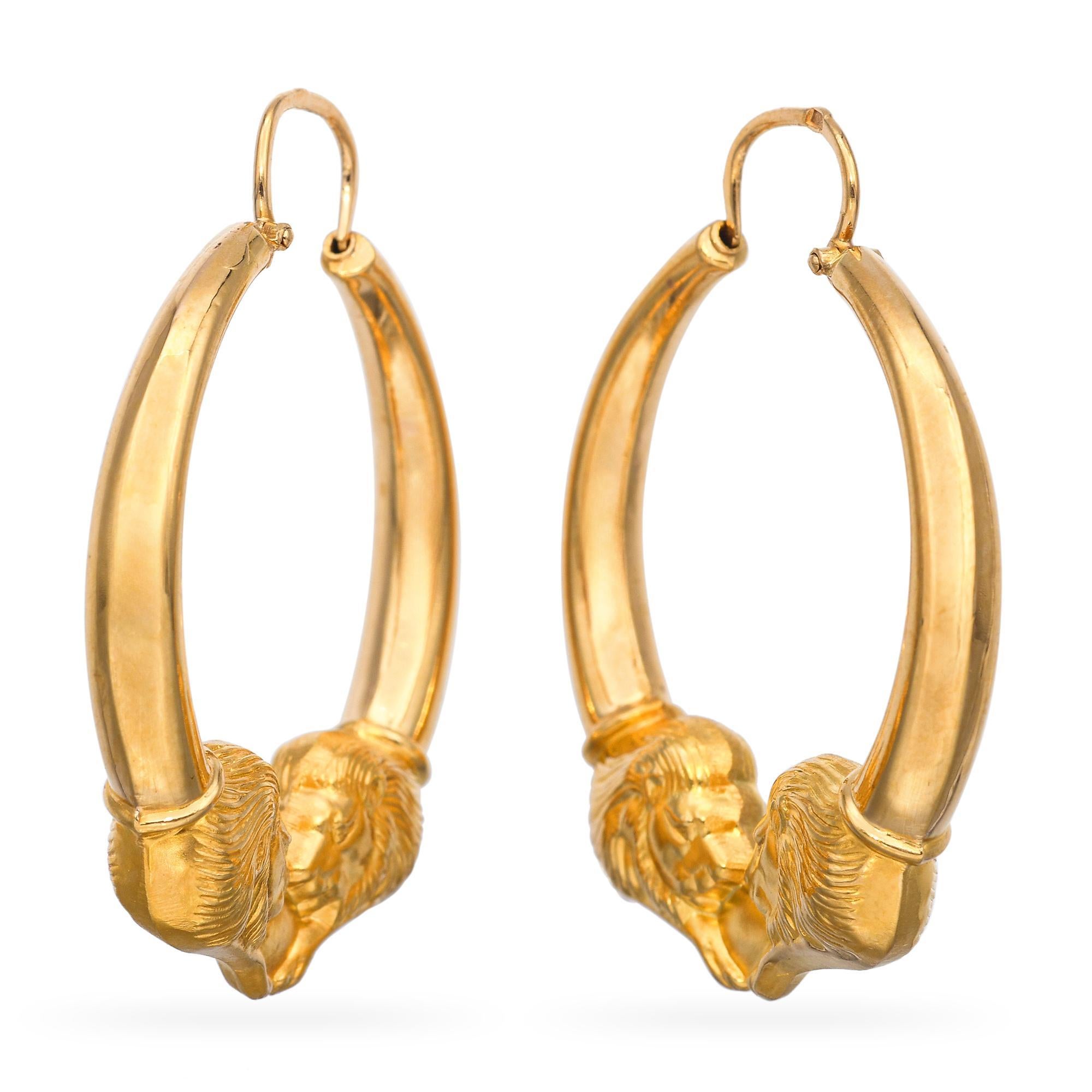 These bold and regal hoop earrings are crafted in rare 19k yellow gold, featuring intricately detailed lion head motifs at the center. The lion design adds a powerful and symbolic touch, representing strength, courage, and nobility. Each earring is