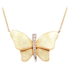 Collier papillon en or jaune/platine 19K et diamant rond brillant de 0,25cttw