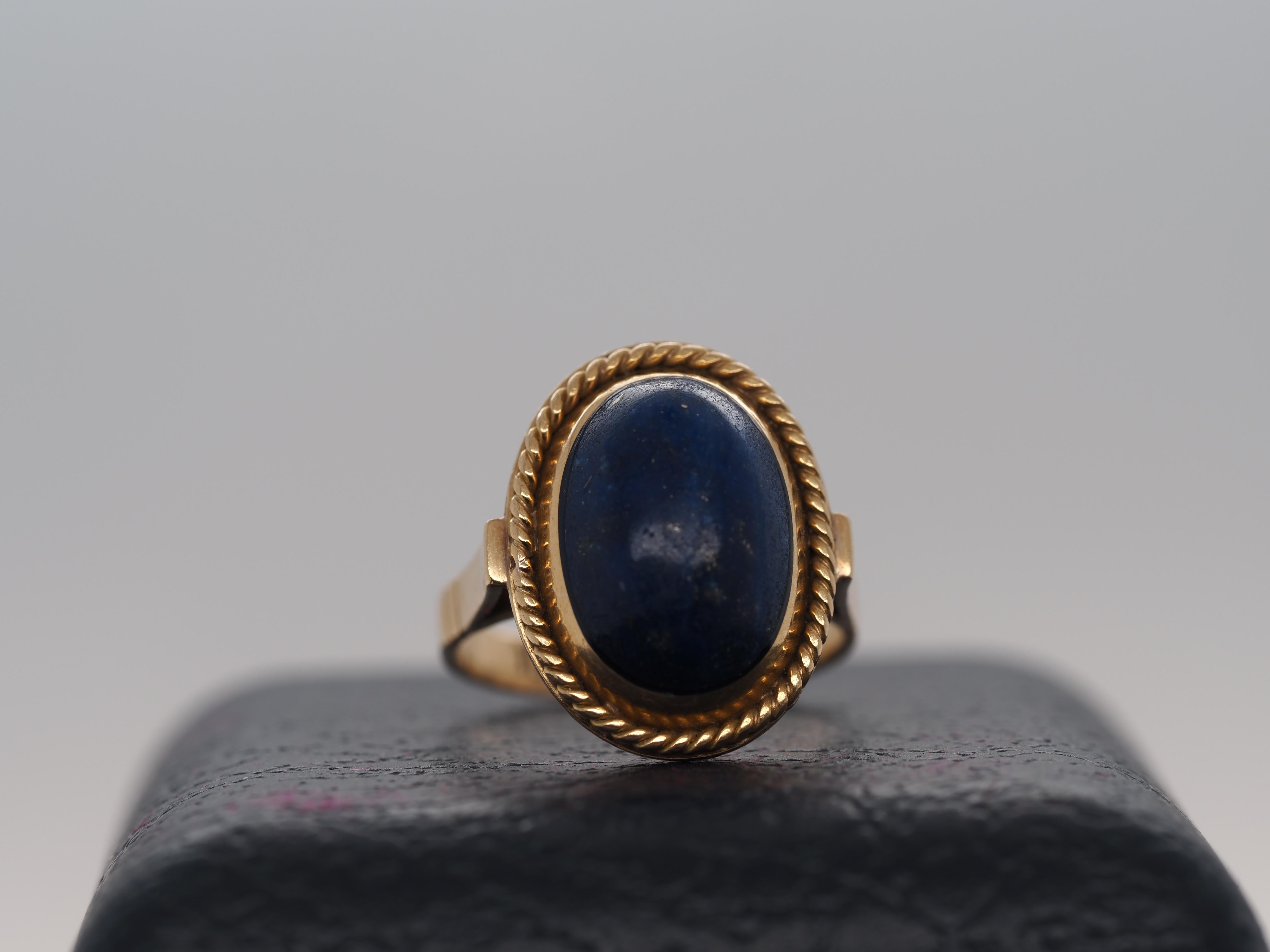 Item Details:
Ring Size: 4.25
Metal Type: 19K Yellow Gold [Hallmarked, and Tested]
Weight: 4.2 grams
Center Stone: Lapis , 12.5x9mm, Blue, Oval cabochon shape
Band Width: 2.3mm
Condition: Excellent
