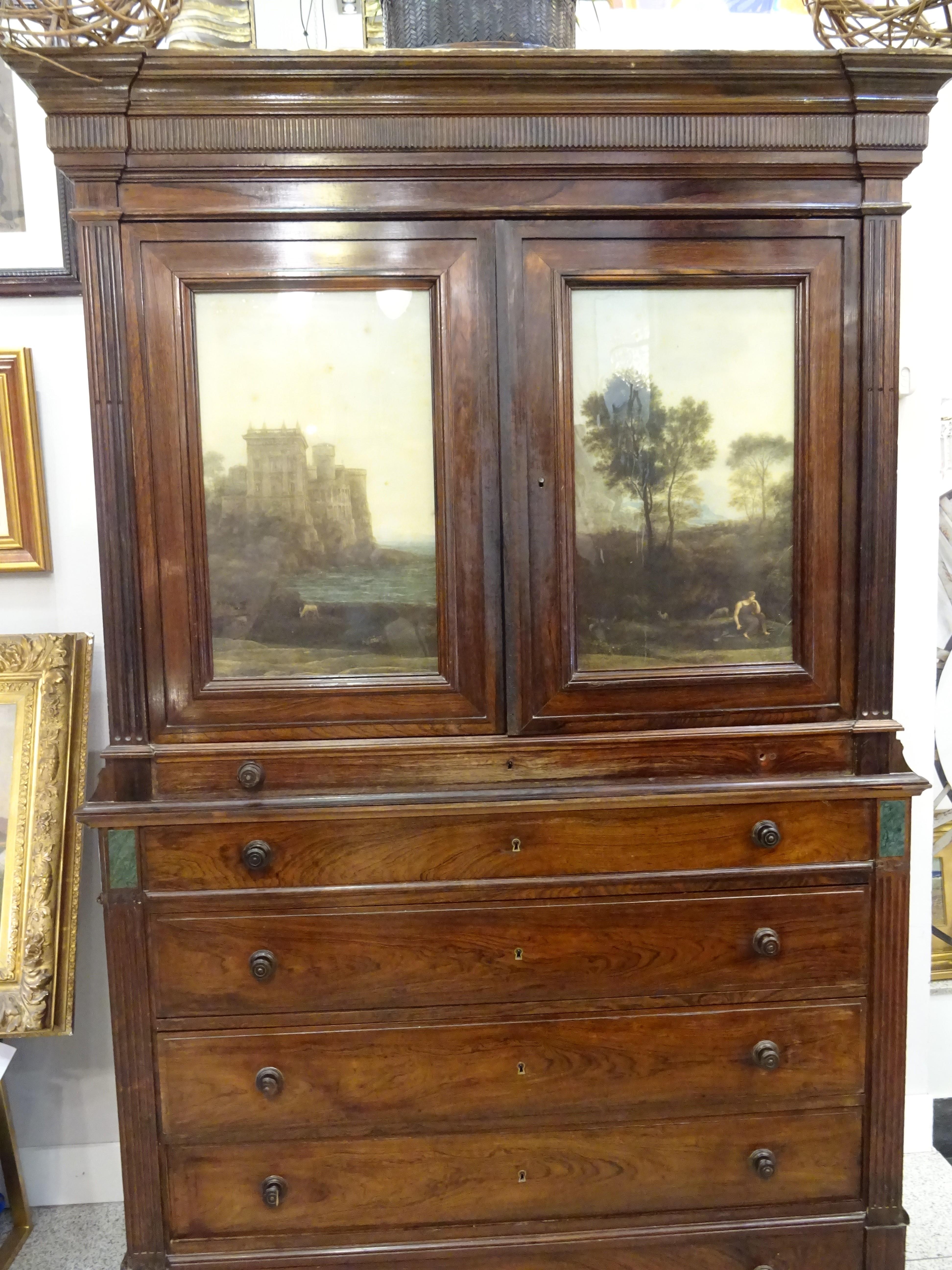 Stunning English Georgian tropical wood cupboard or linen presses, 19th century. Top doors in blown glass with gorgous Italian offsets printing, at the bottom there is a first drawer that is made table, and five more drawers. On the sides some green
