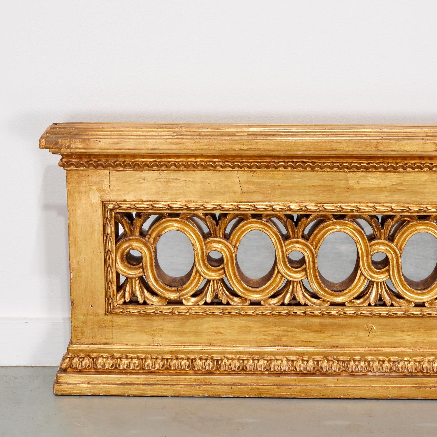 Architectural Louis XVI Style Giltwood Frieze Panel with Mirror, 80” Wide
France, Late 19th/Early 20th Century

An impressive architectural Louis XVI style giltwood frieze panel of exceptional scale, measuring 80 inches wide. Finely carved with