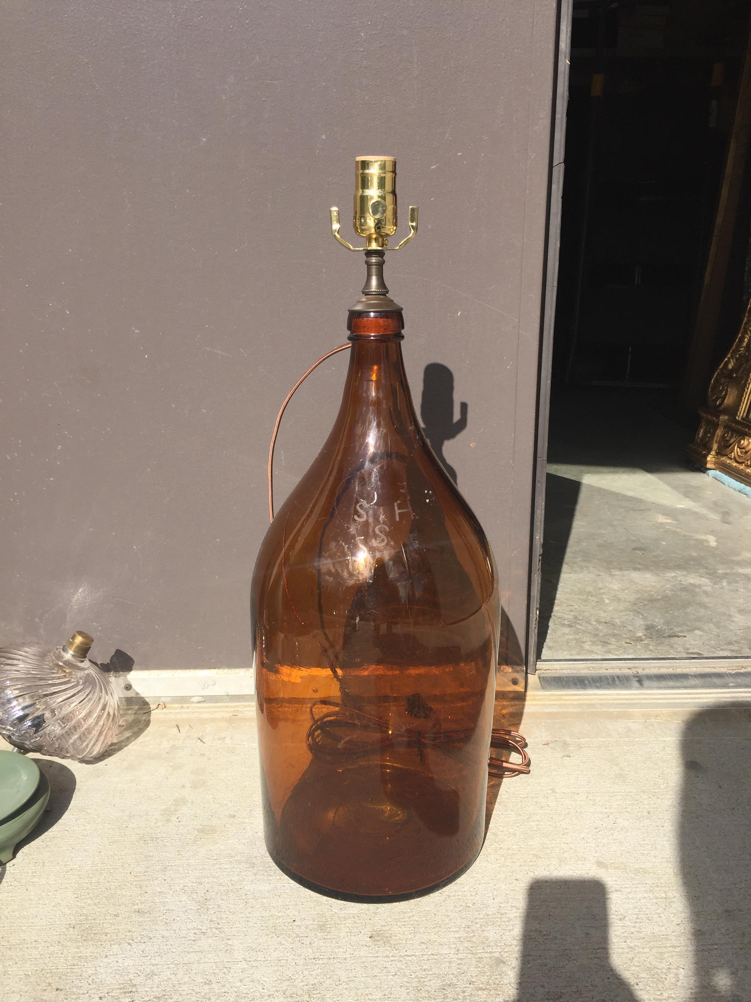19th-20th century amber glass bottle as lamp
New wiring.