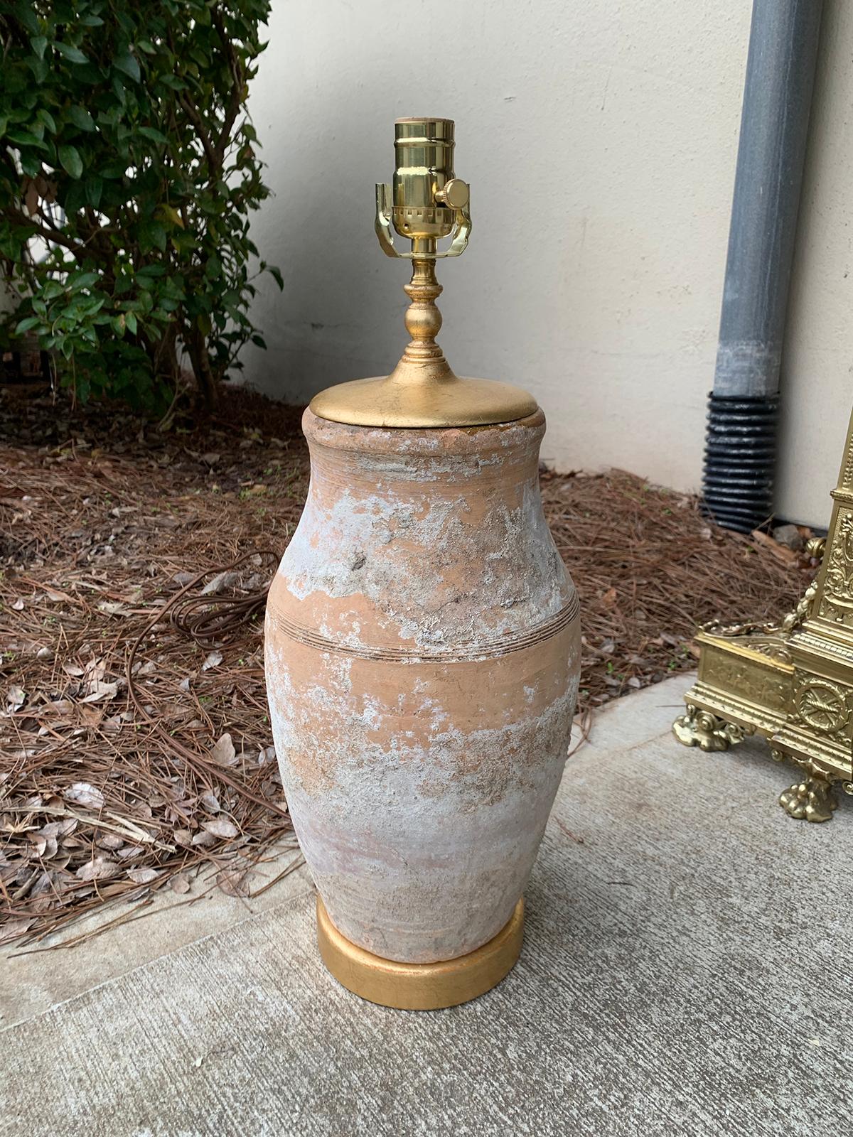 19th-20th century Asian pottery lamp on custom giltwood base
New wiring.