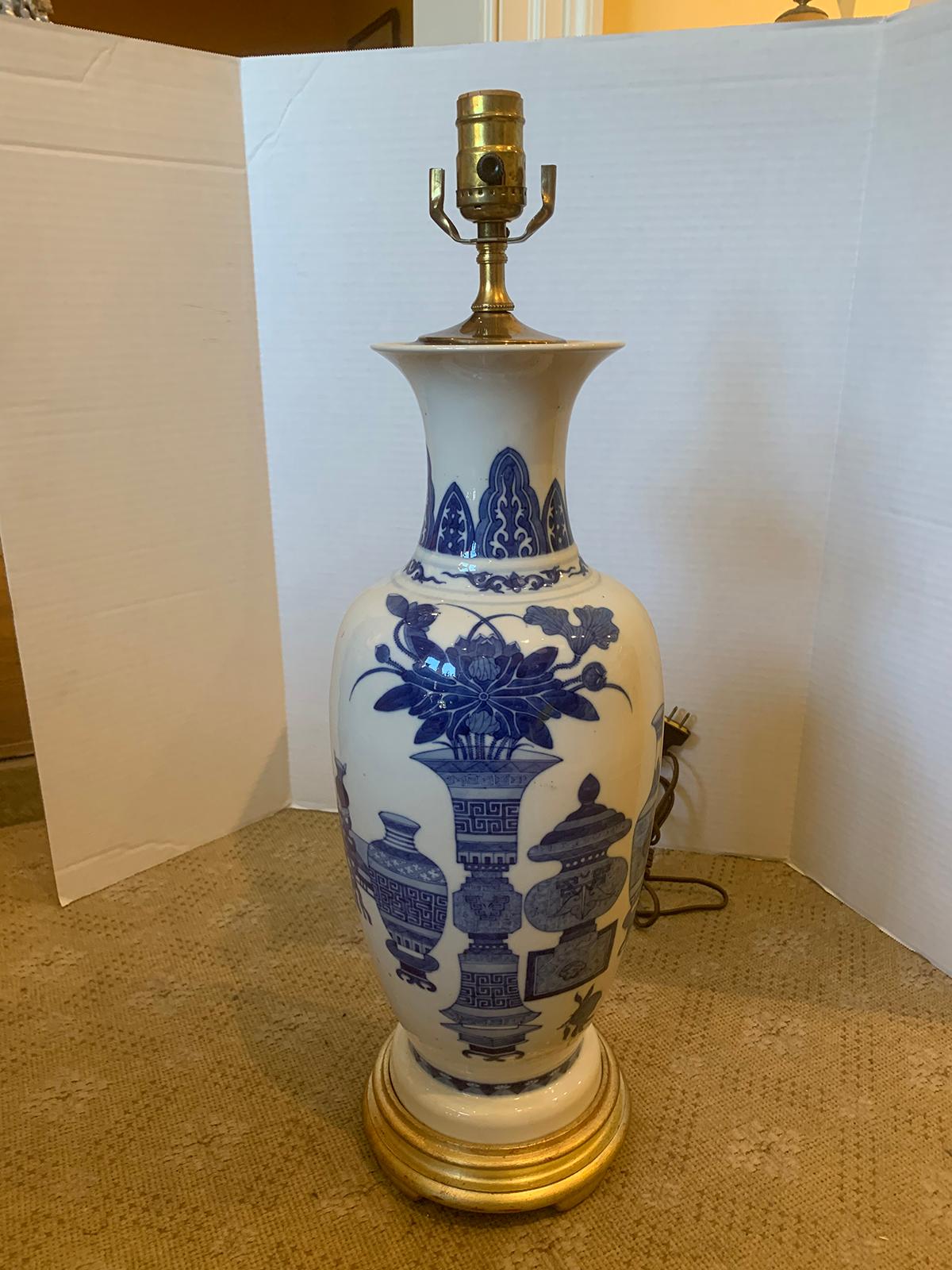19th-20th century blue and white porcelain lamp from Estate of D. Byers. Possibly old W.E. Brown Co.
New wiring.
