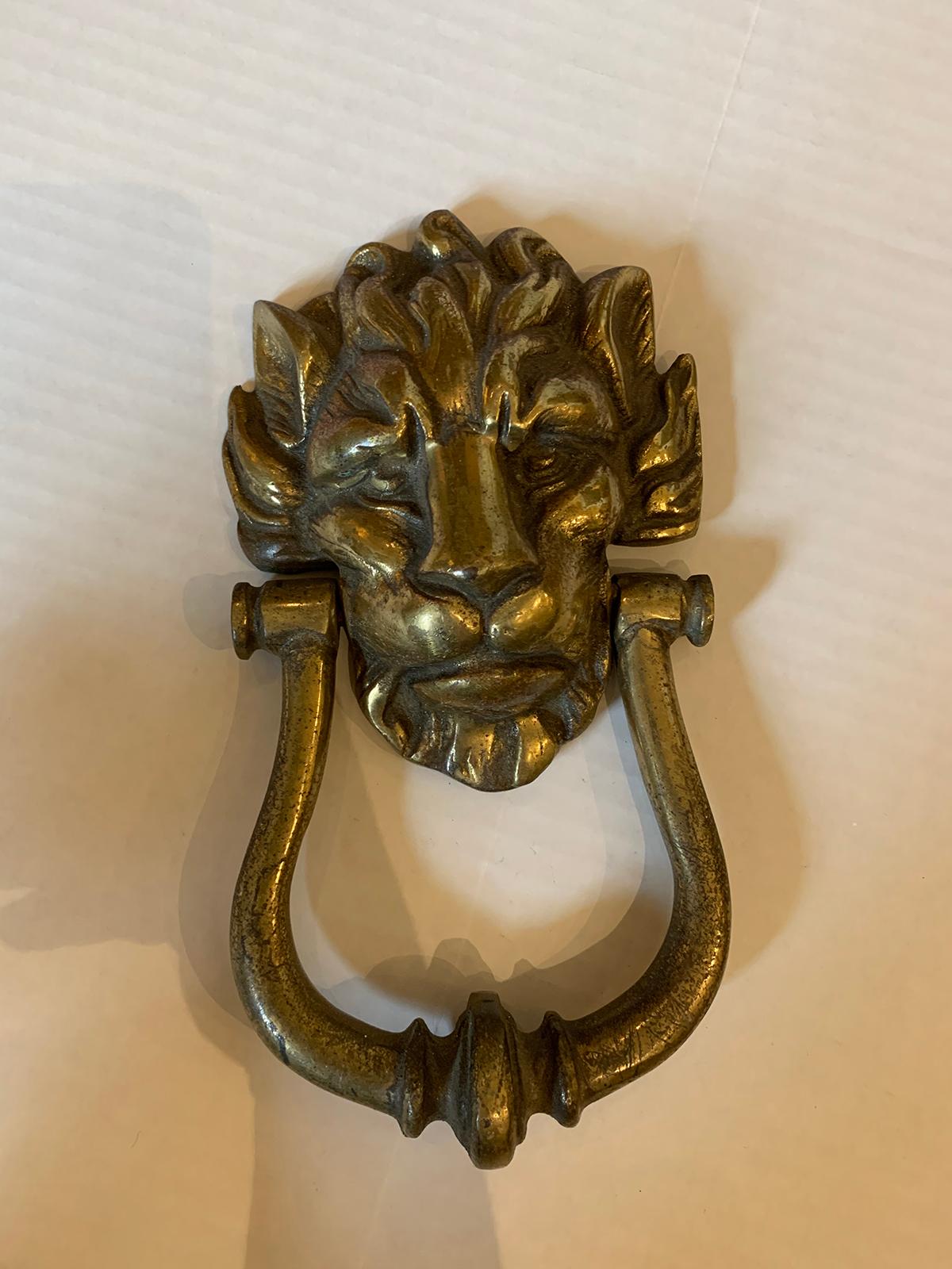19th-20th century bronze lion door knocker with strike.