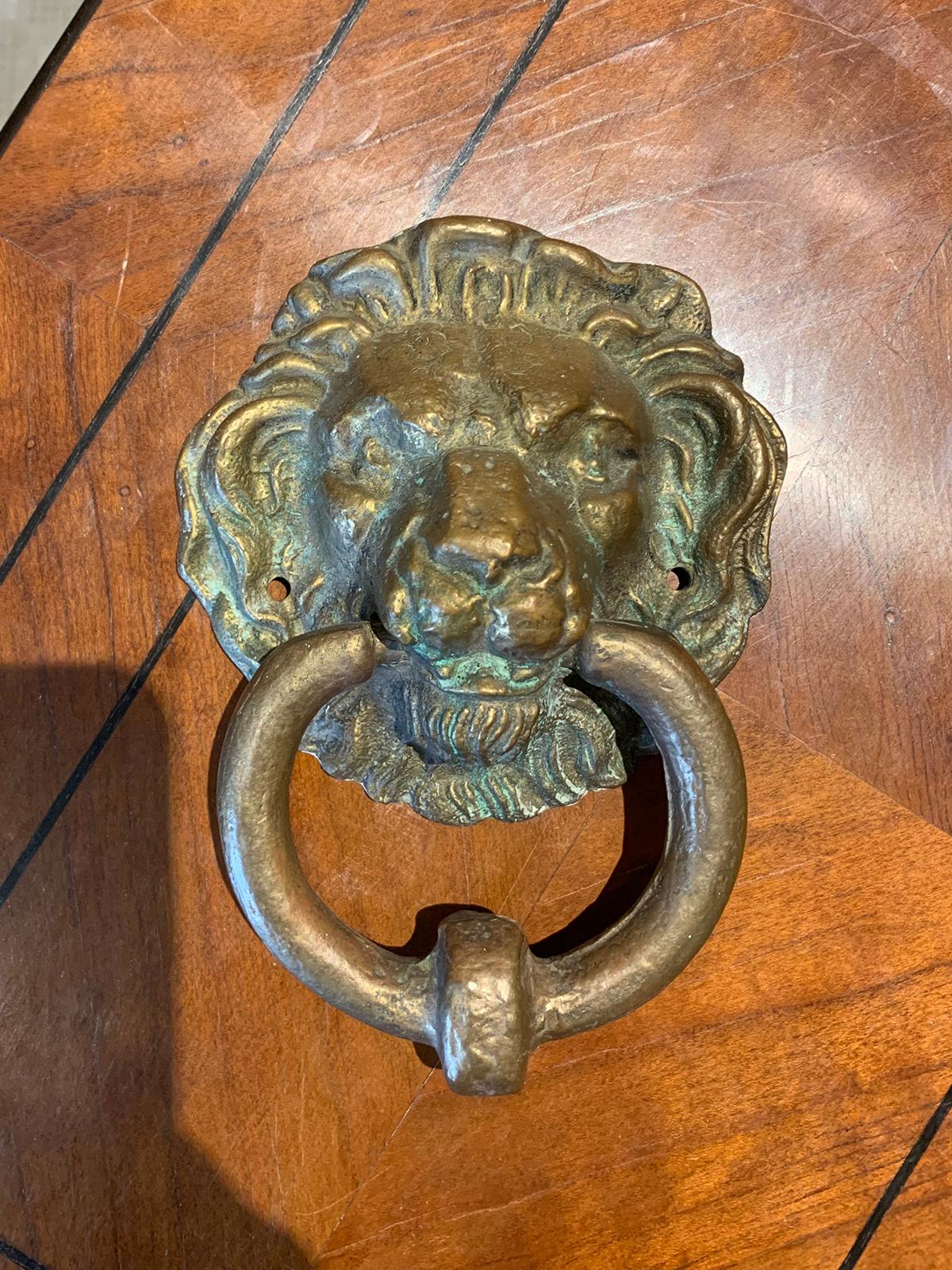 19th-20th century bronze lion head door knocker.