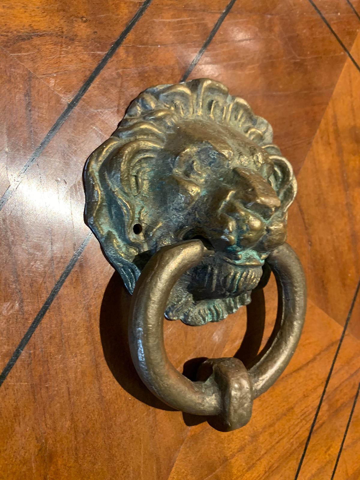 bronze lion door knocker