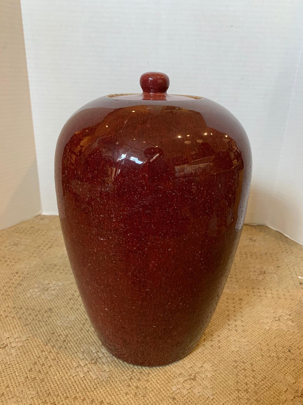 19th-20th century Chinese Sang de Boeuf ox blood red flambe glazed porcelain lidded vase, unmarked.