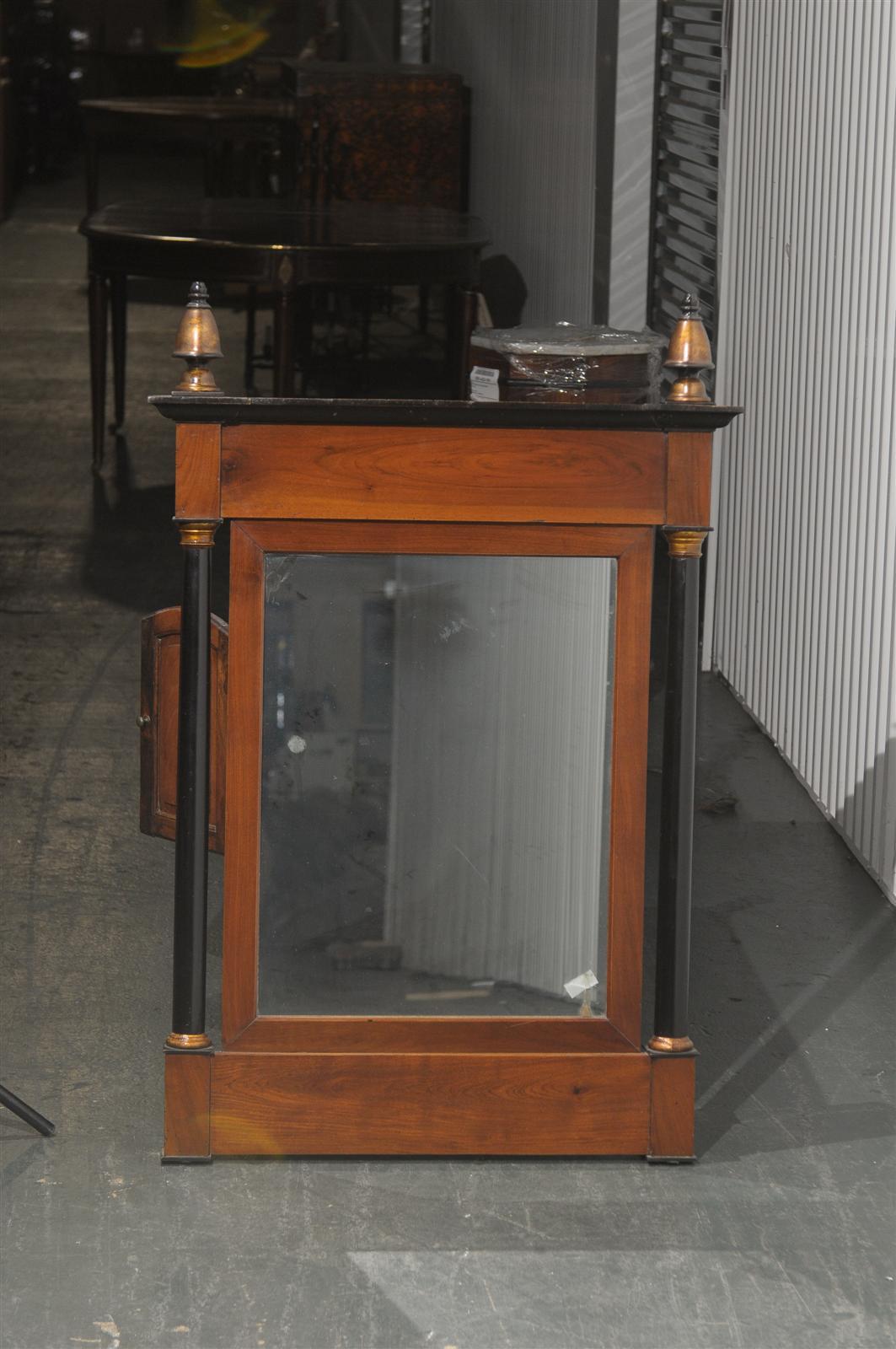 19th-20th century continental wood mirror.
