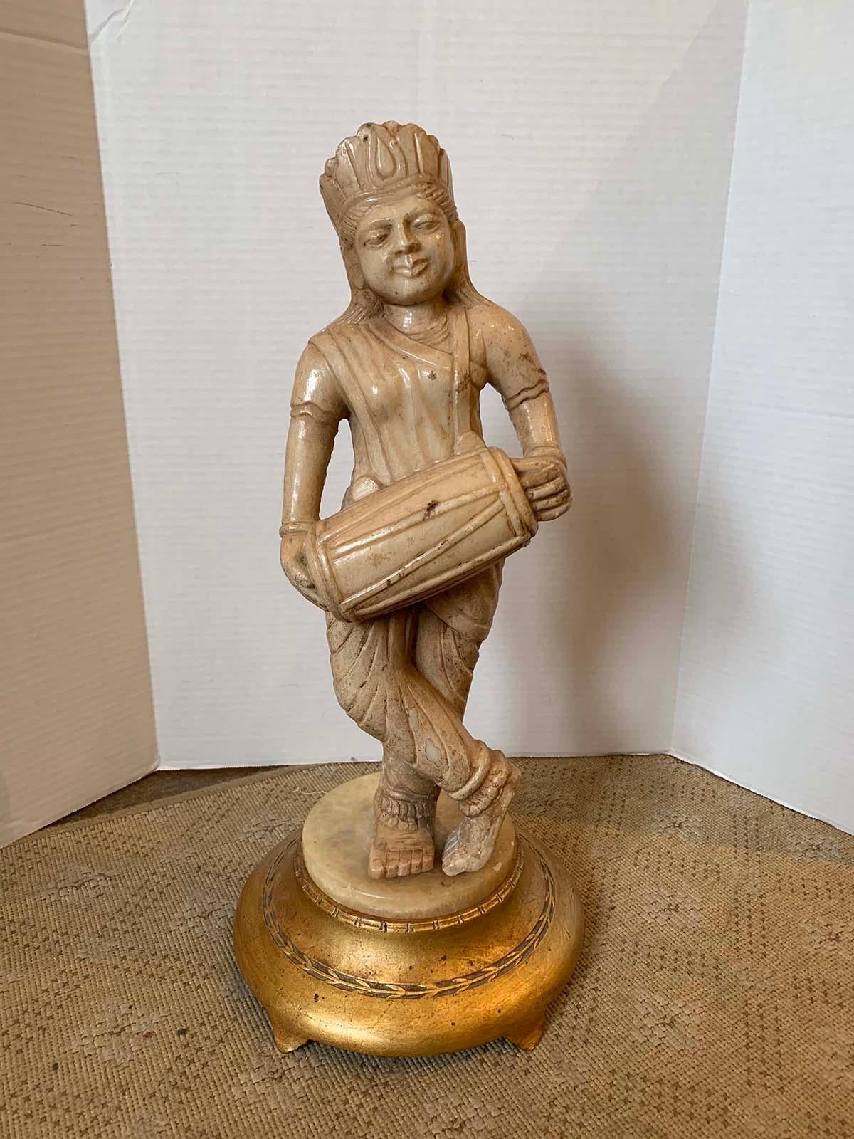 19th-20th century Eastern Indian marble figure on giltwood base.
