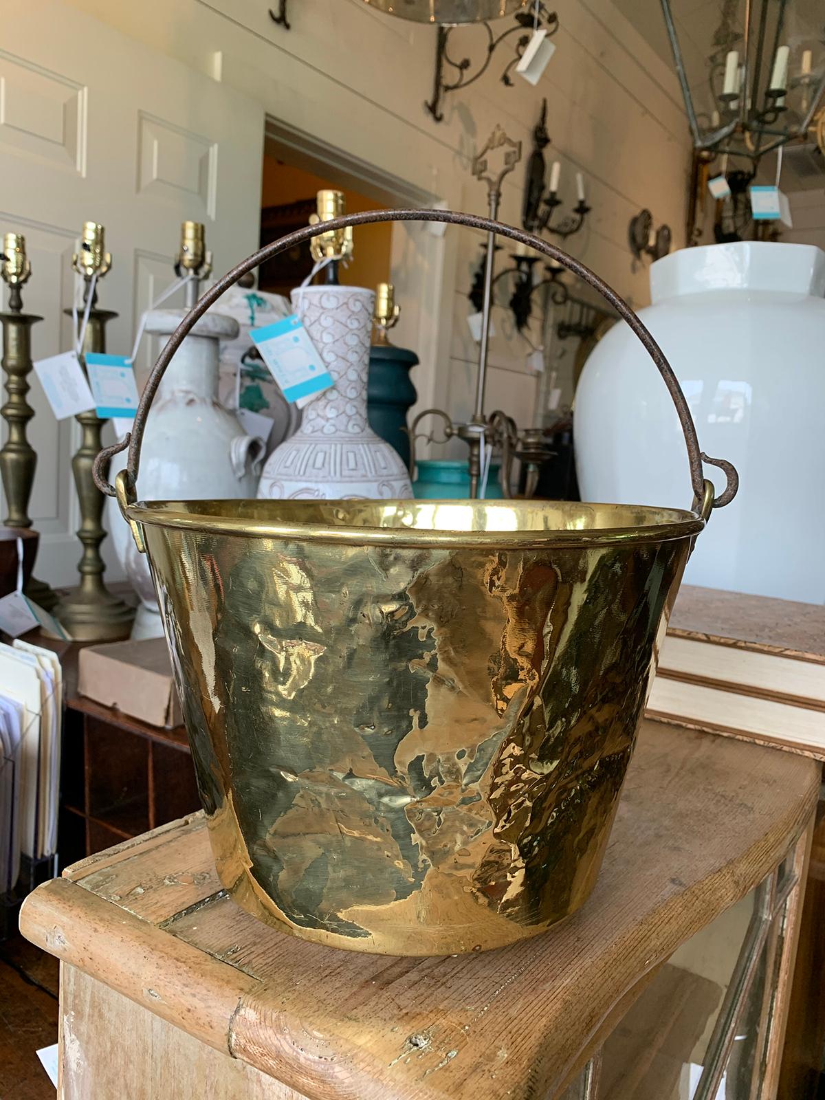 19th-20th century English brass bucket with iron handle
8