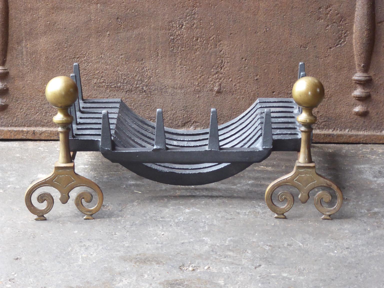 19th-20th century English Victorian fireplace basket, fire grate made of wrought iron, cast iron and brass. The total width of the front of the grate is 56 cm (22 inch).







 