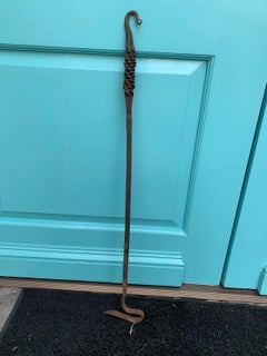 19th-20th Century Hand Forged Iron Fireplace Poker with Braided Handle